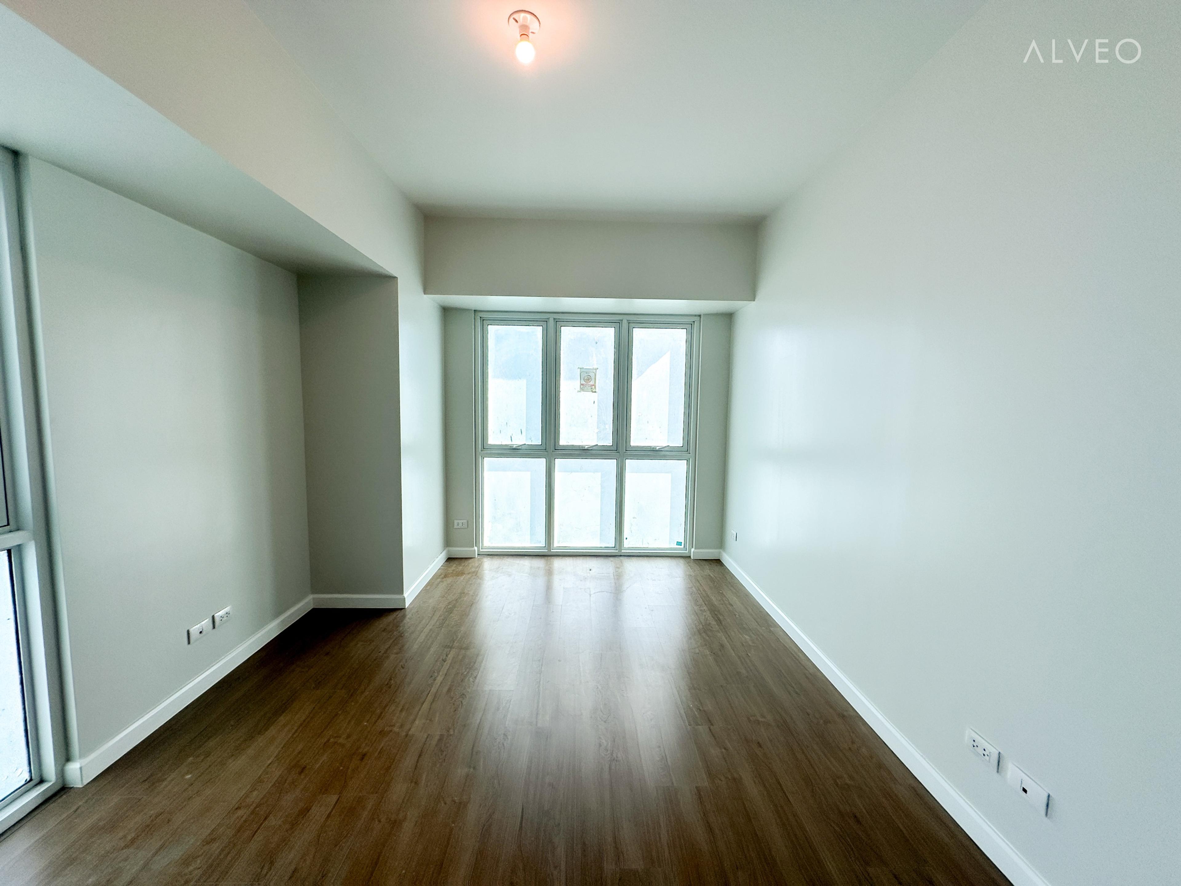 Cerule at Solinea three-bedroom unit bedroom with a built-in wardrobe and an ensuite bathroom off the room