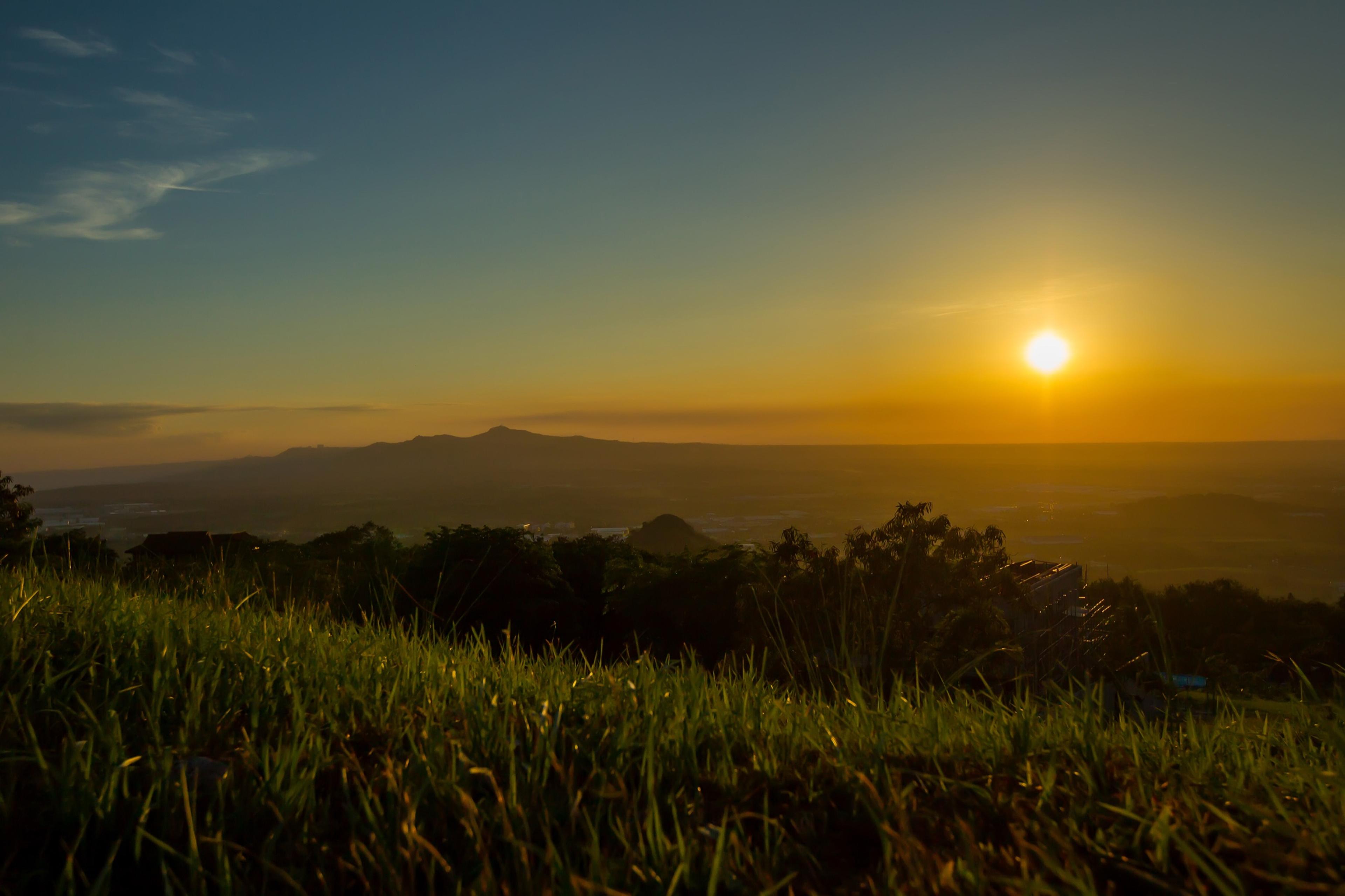 The Ayala Greenfield Estates hillside landscape at sunset, Calamba, Laguna