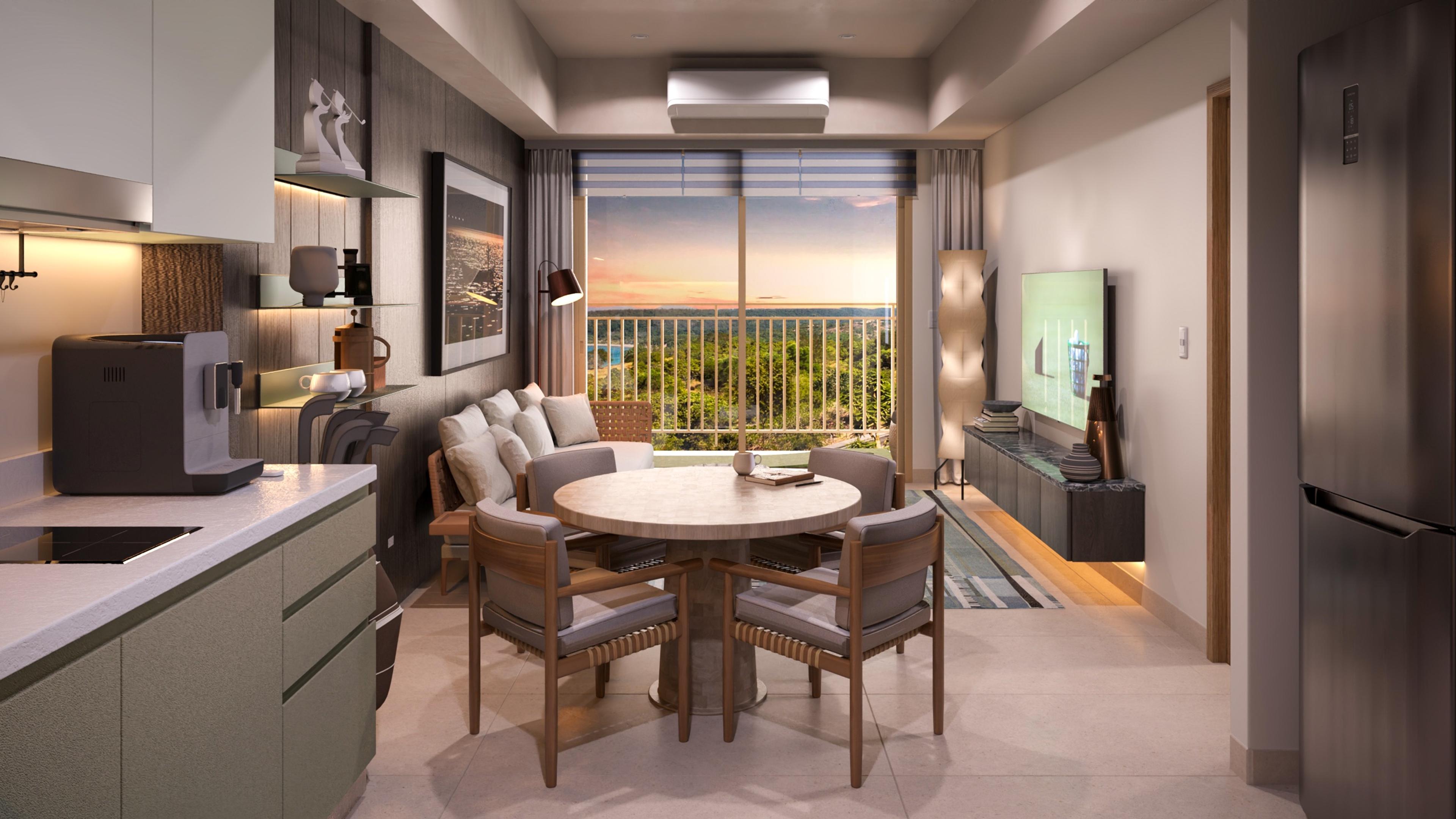 Render of a Searidge Residences one-bedroom kitchen and dining area, with a round dining table beside a balcony framing a sea view