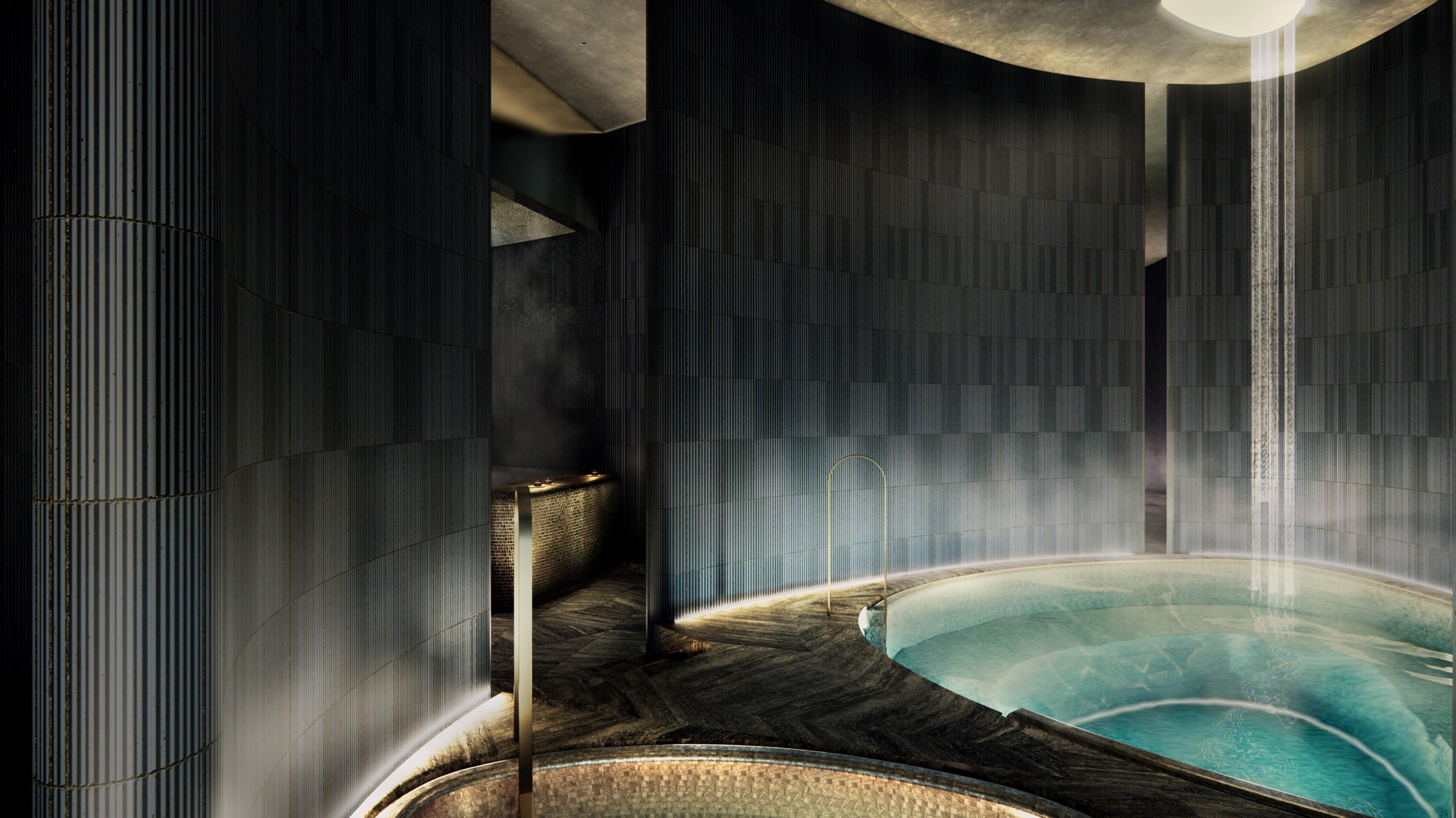 Render of the Park Villas thermal pool spa, a dimly lit stone-clad room with steaming warm-water plunge pools