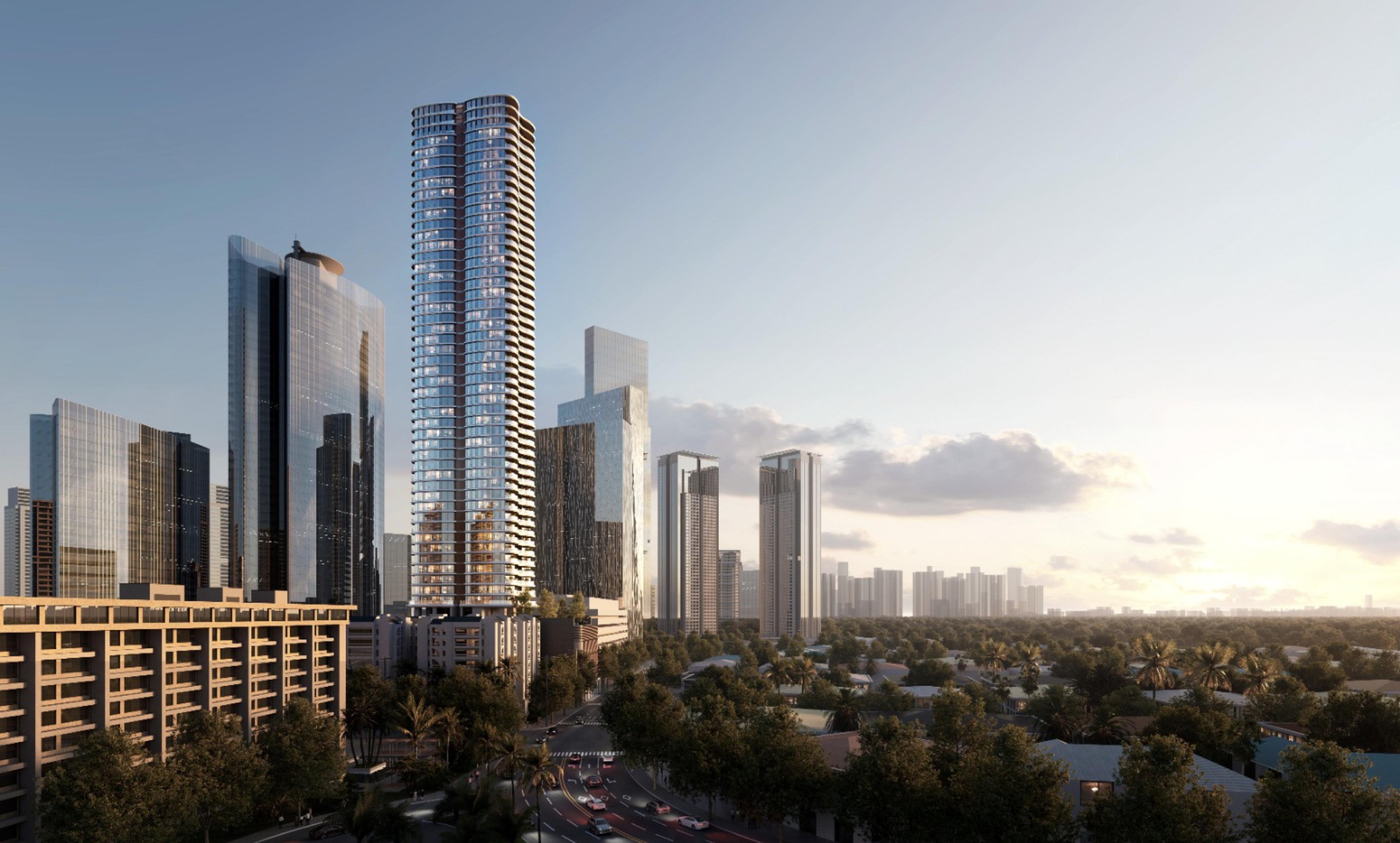 Park Villas tower at golden hour, with its curved-balcony facade standing tall among the Makati central business district towers