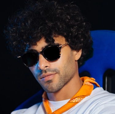 حماية أعينكم من الوهج الضوئي: أهمية النظارات الشمسية بعدسات بولارايزد.