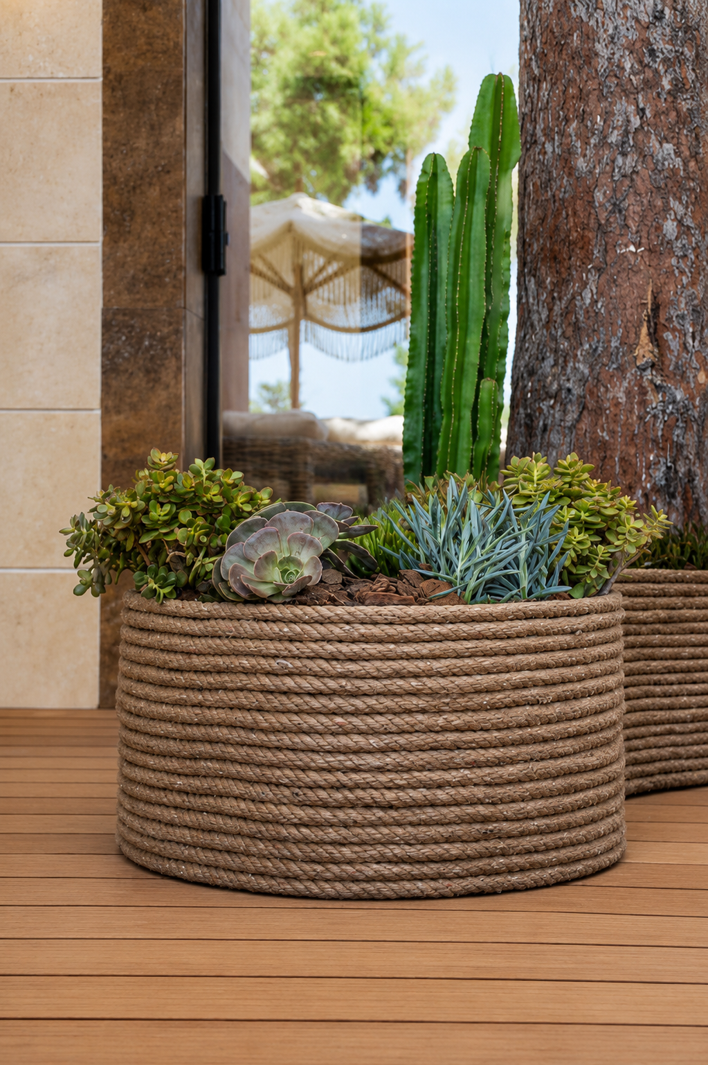 Close view of horizontal rope wrapping around a planter filled with cacti and low planting at Vogue Hotel Supreme Bodrum.