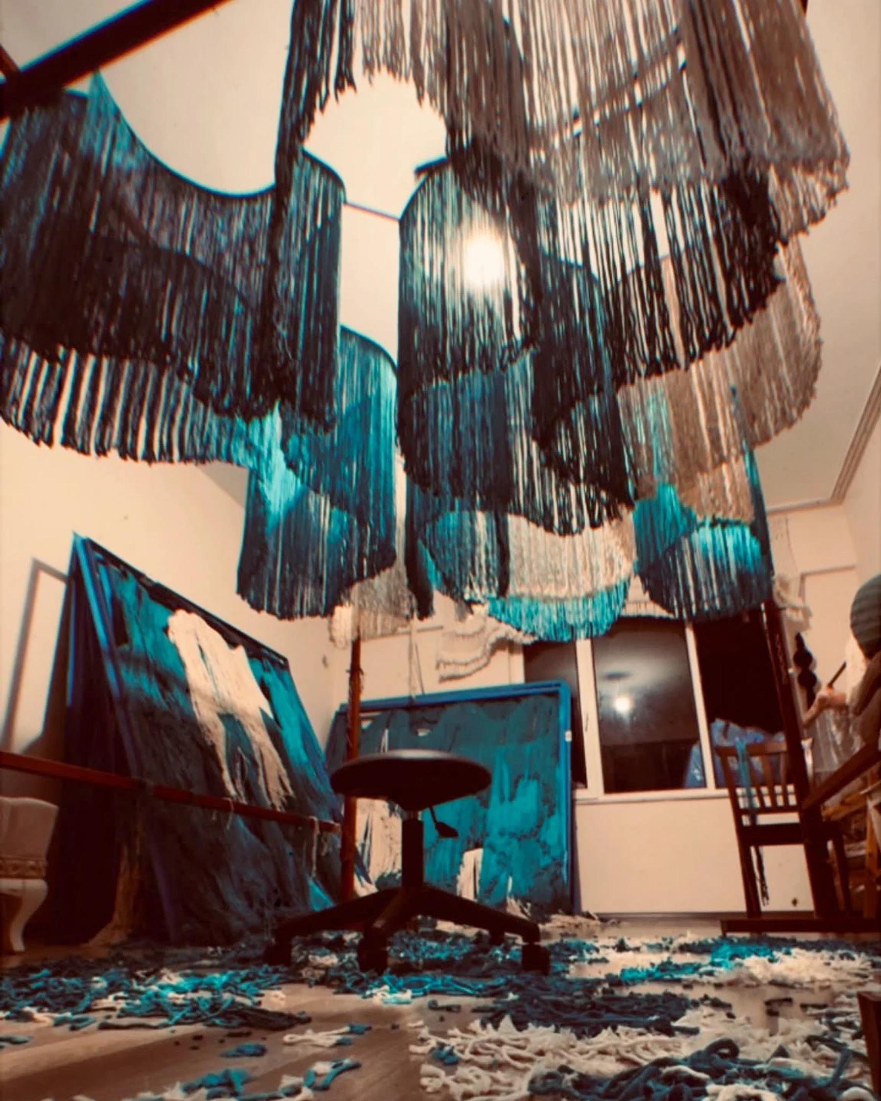 Hanging fibre panels during workshop production