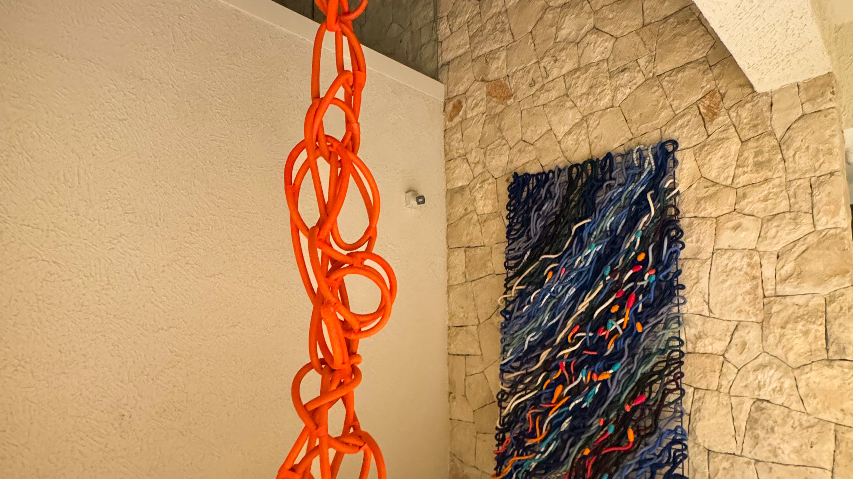 Karma and Mavi together in the stone-walled space at WAM by Karma