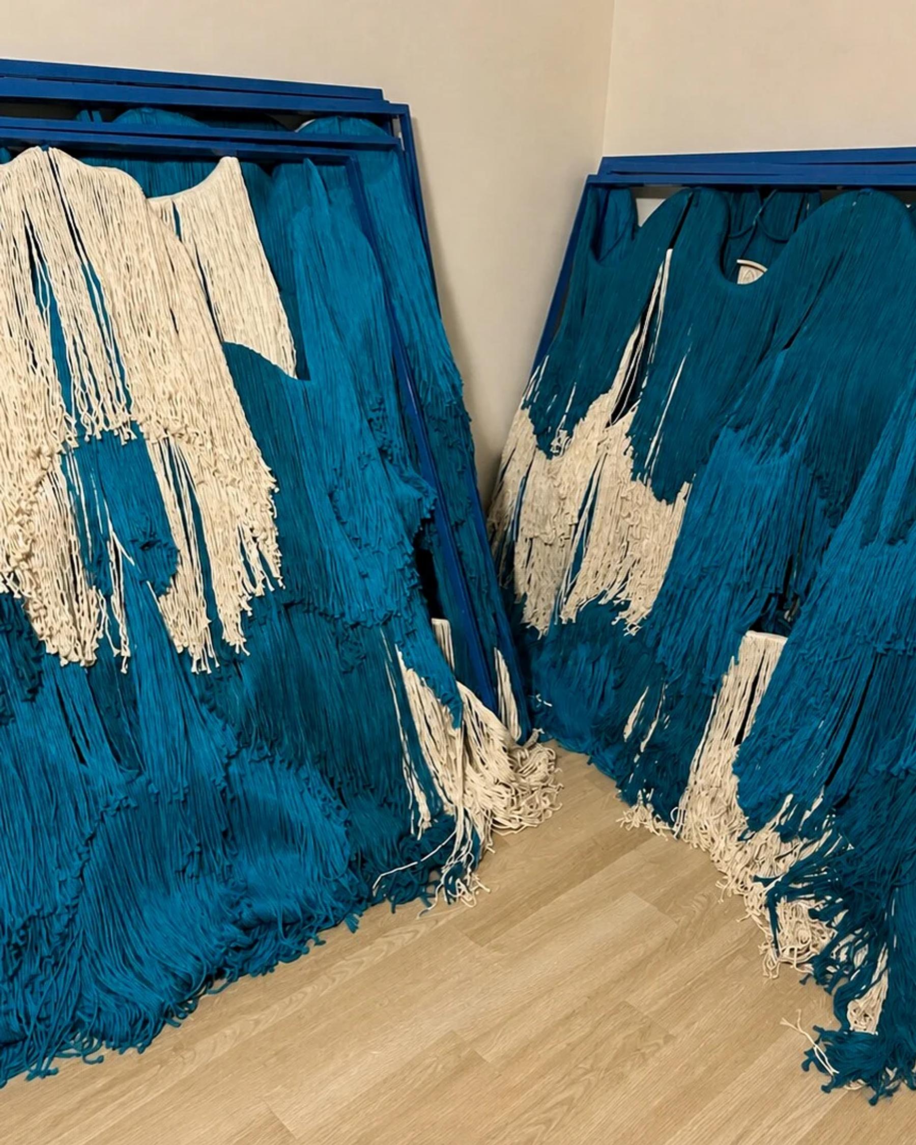 Ecru and turquoise hanging layers before dispatch
