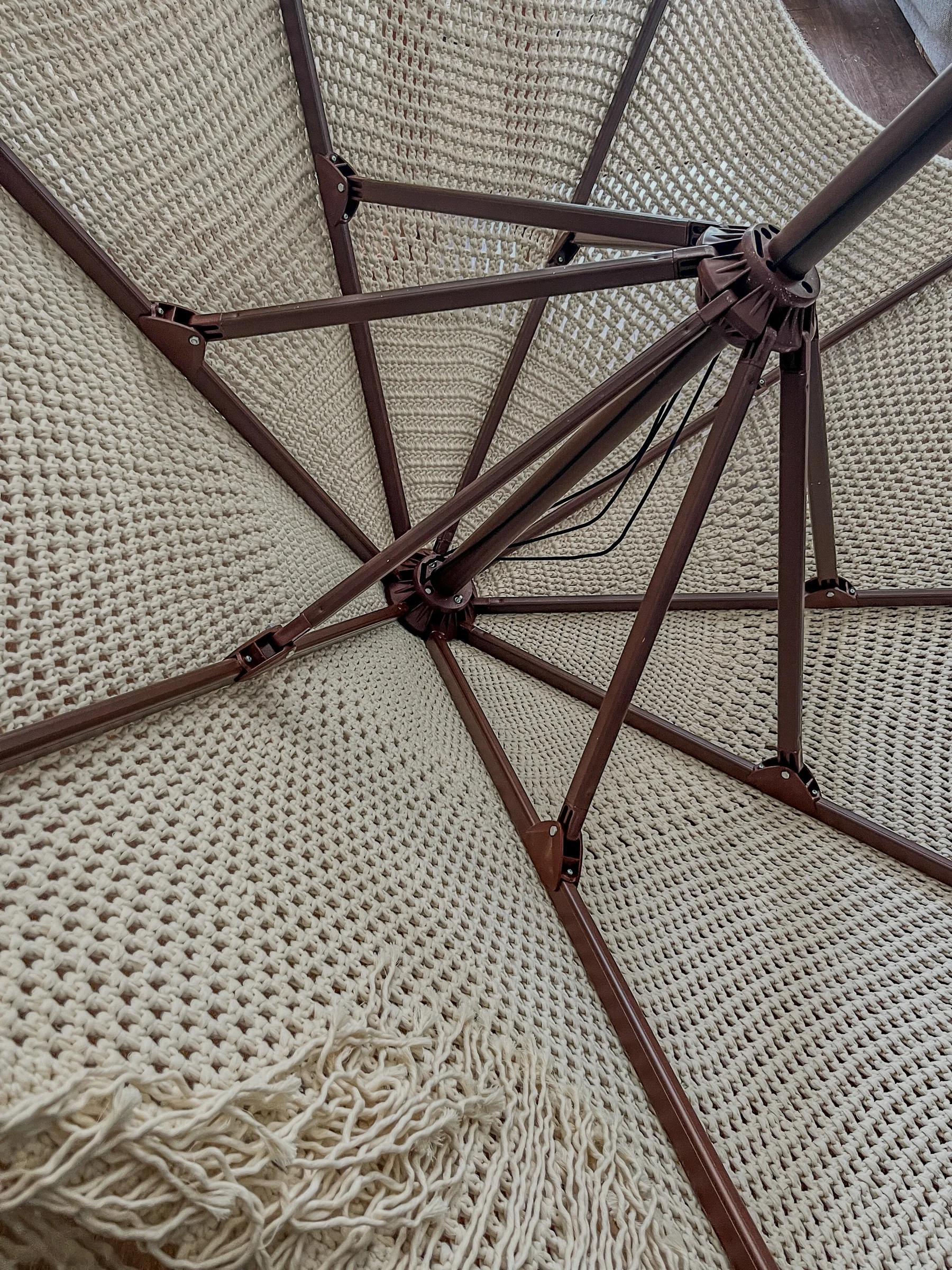 Ecru handwoven parasol seen from below