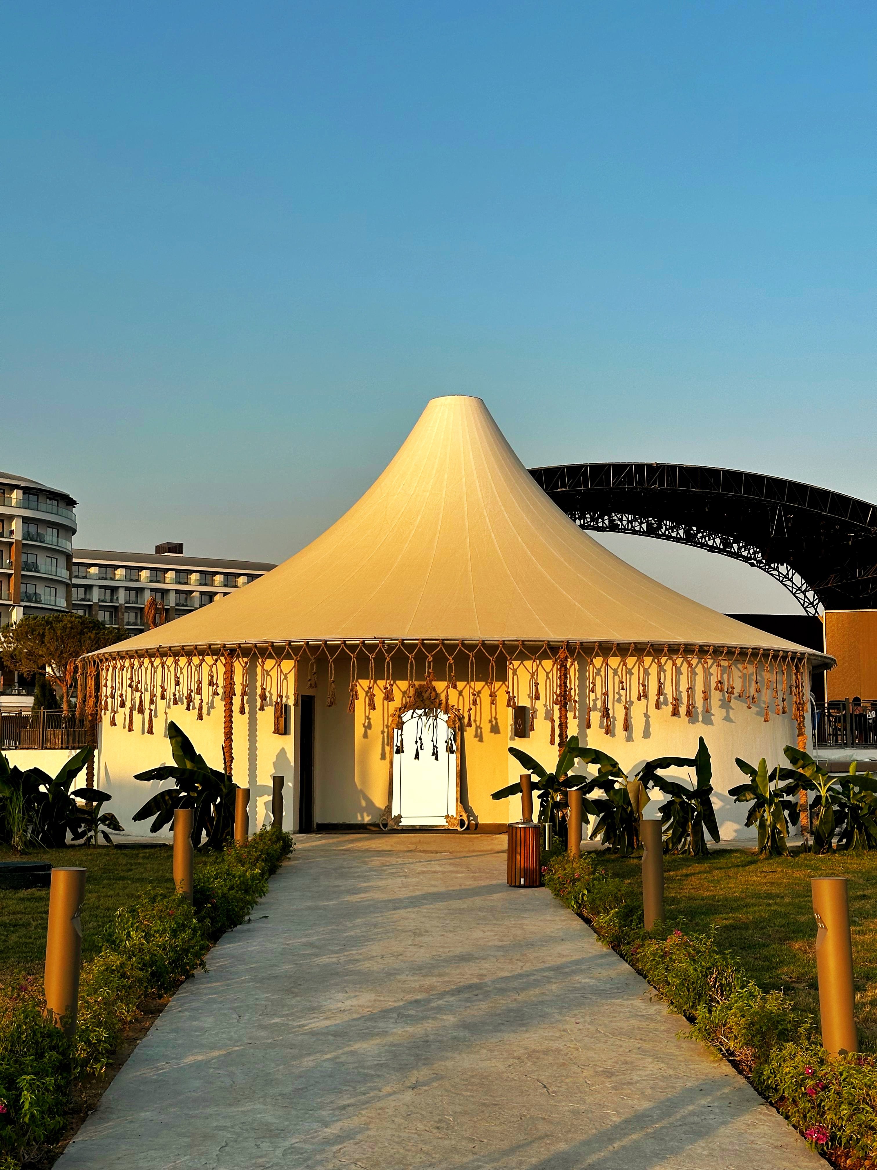 Conical tented pavilion at Ethno Hotels Belek with Dimare handcrafted rope fringe and tasseled valance over the entrance