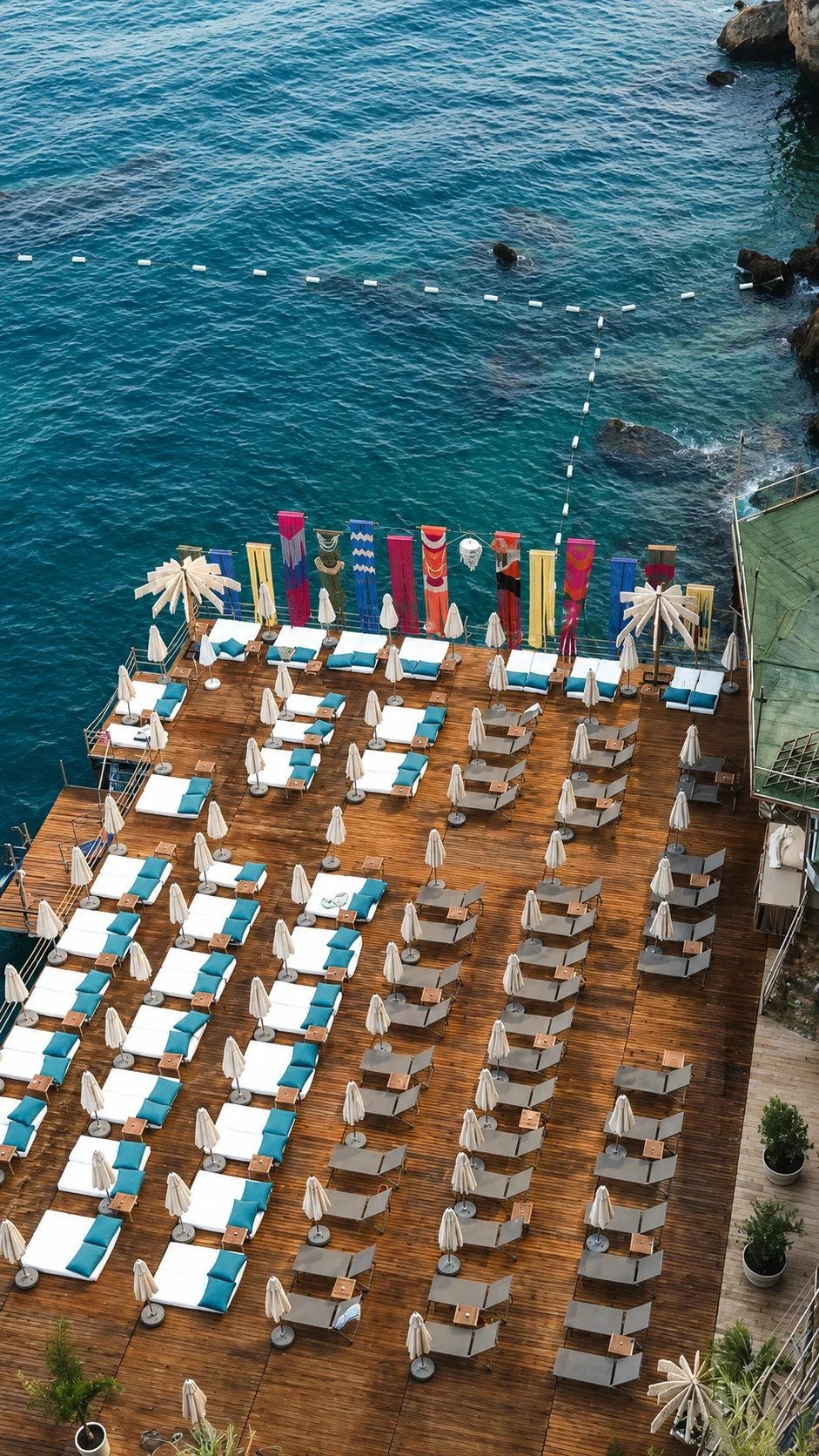 Aerial view of the Bilem Beach deck with the Dimare fibre-art banner columns lining the sea edge