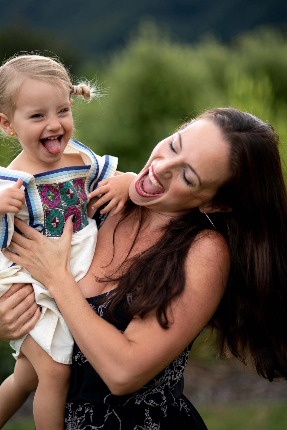mum and toddler laughing