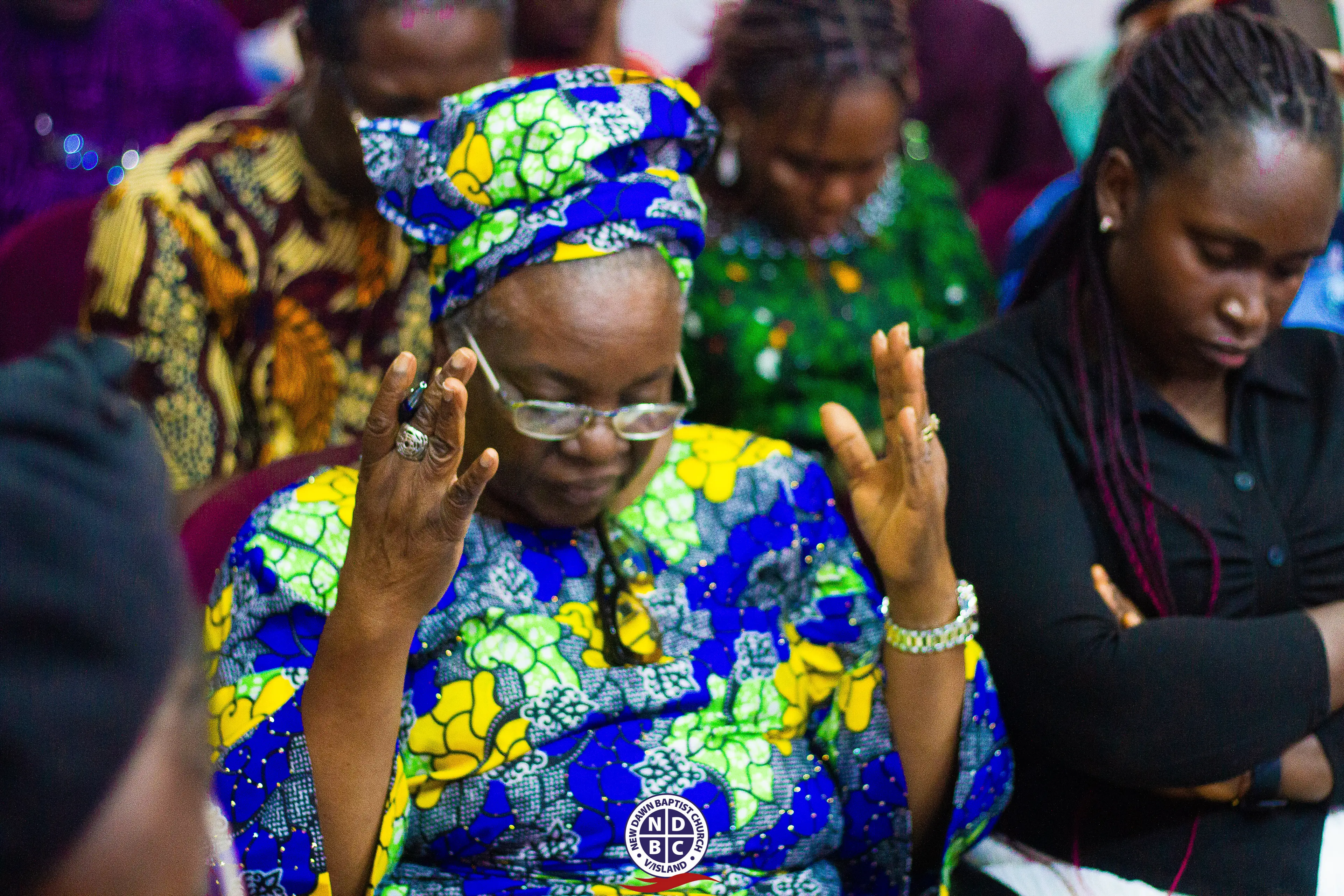 Elderly woman worshiping