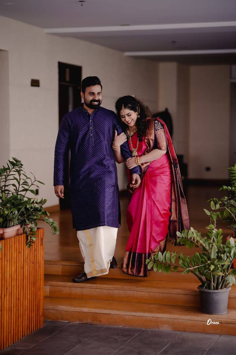 Newlywed couple in a quiet moment at home, photographed by Oriana Weddings