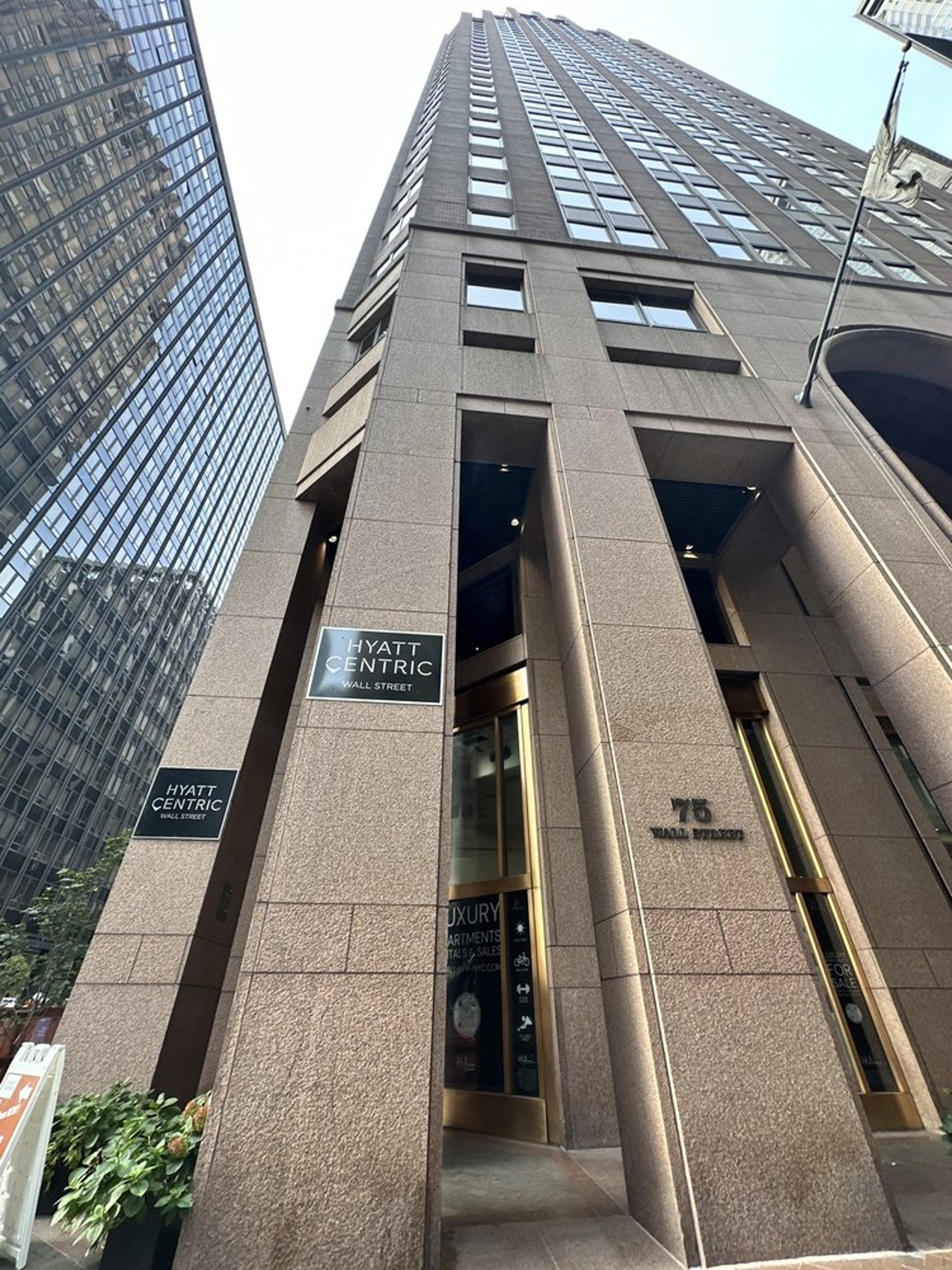 The entrance to 75 Wall Street, the Hyatt Centric building that the spa sits one floor below
