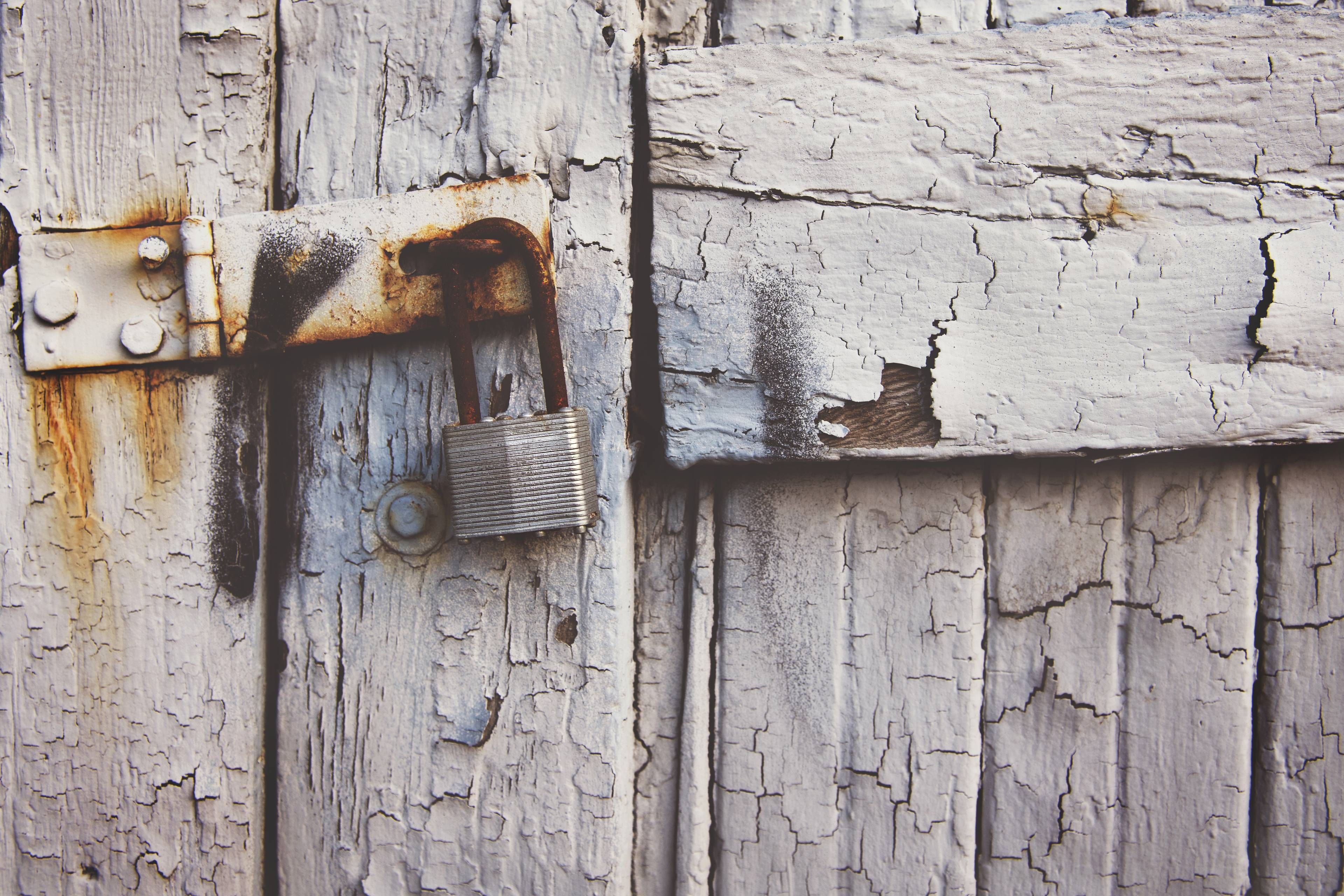 Close up of rusty broken lock