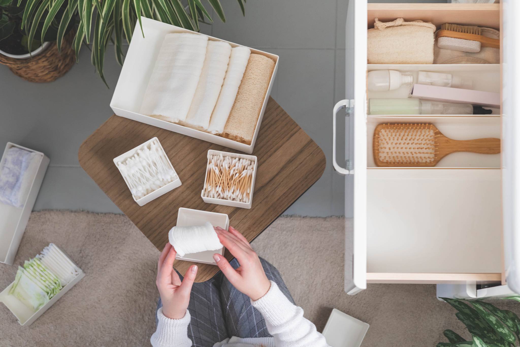 Top view of woman organizing things