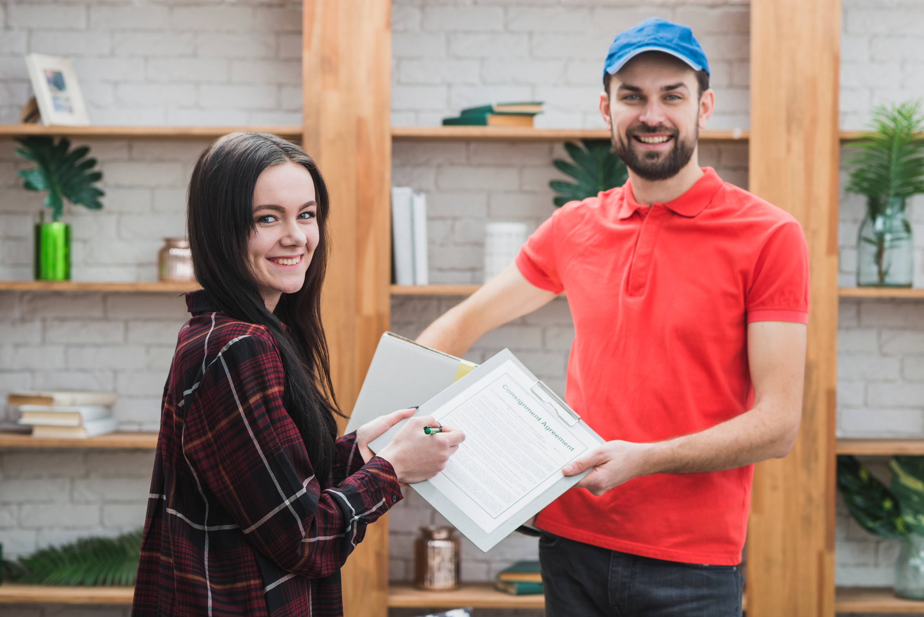 Courrier with clipboard and customer