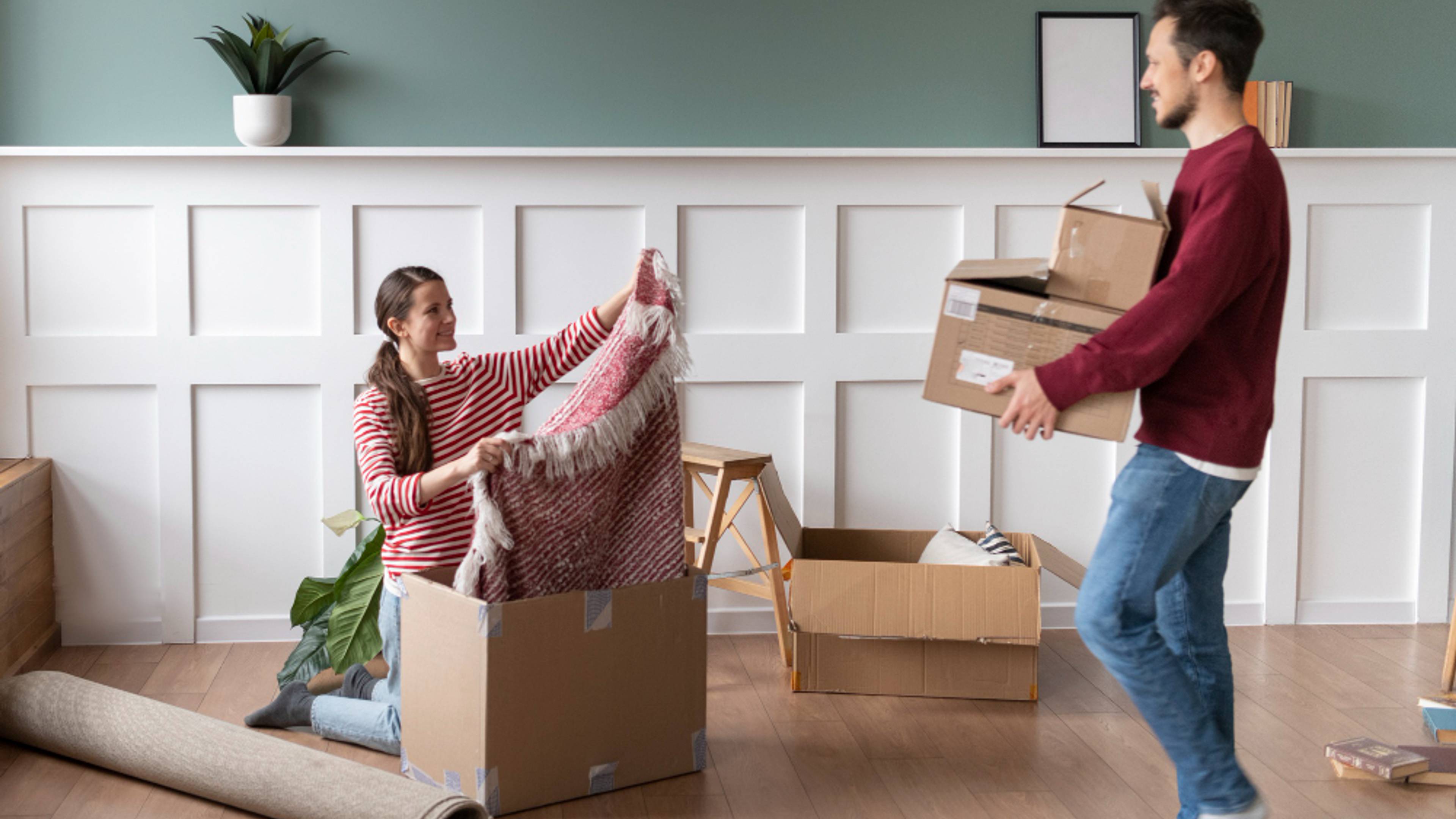 Family packing boxes together