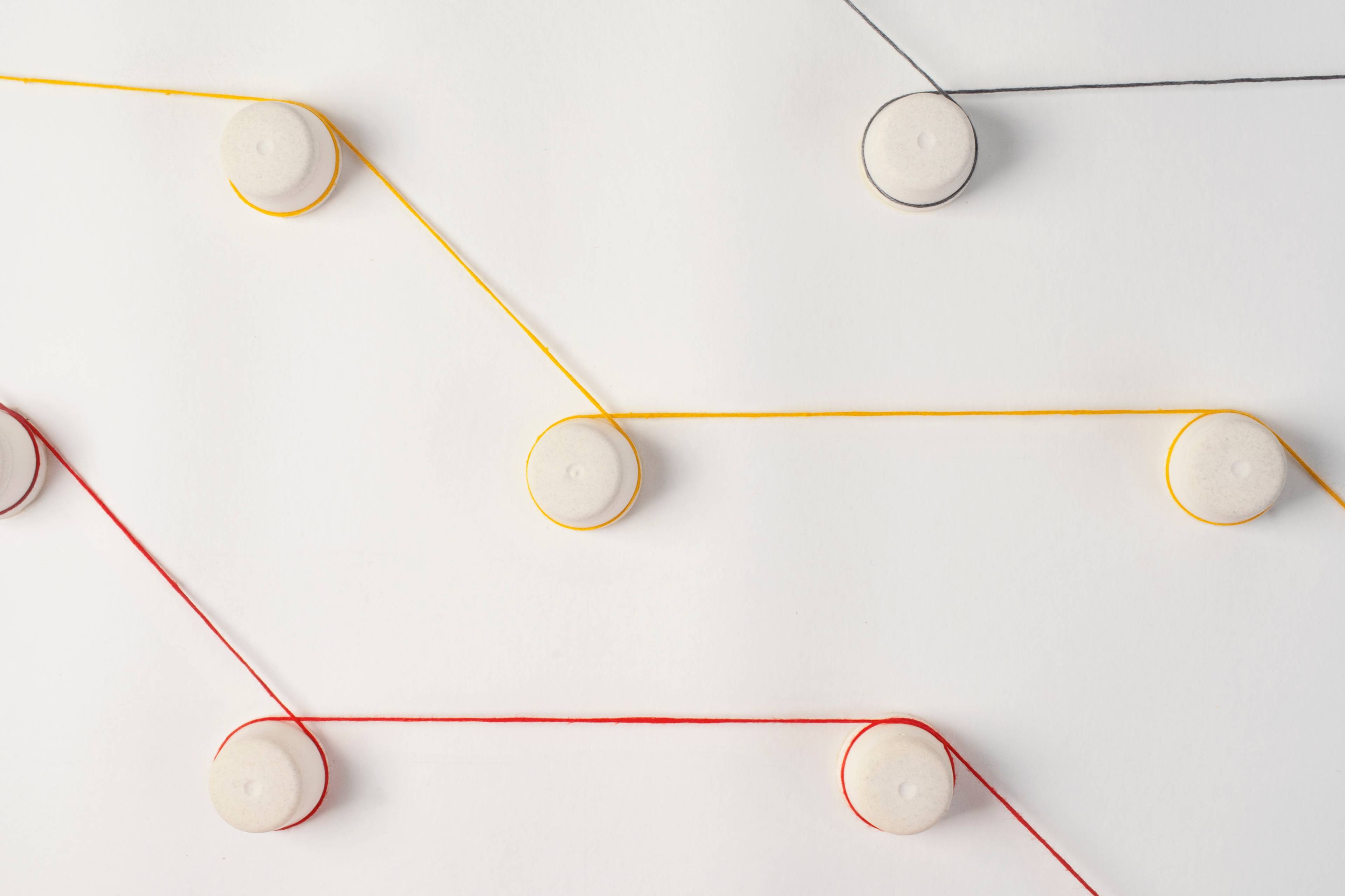 Still life of threads looping.