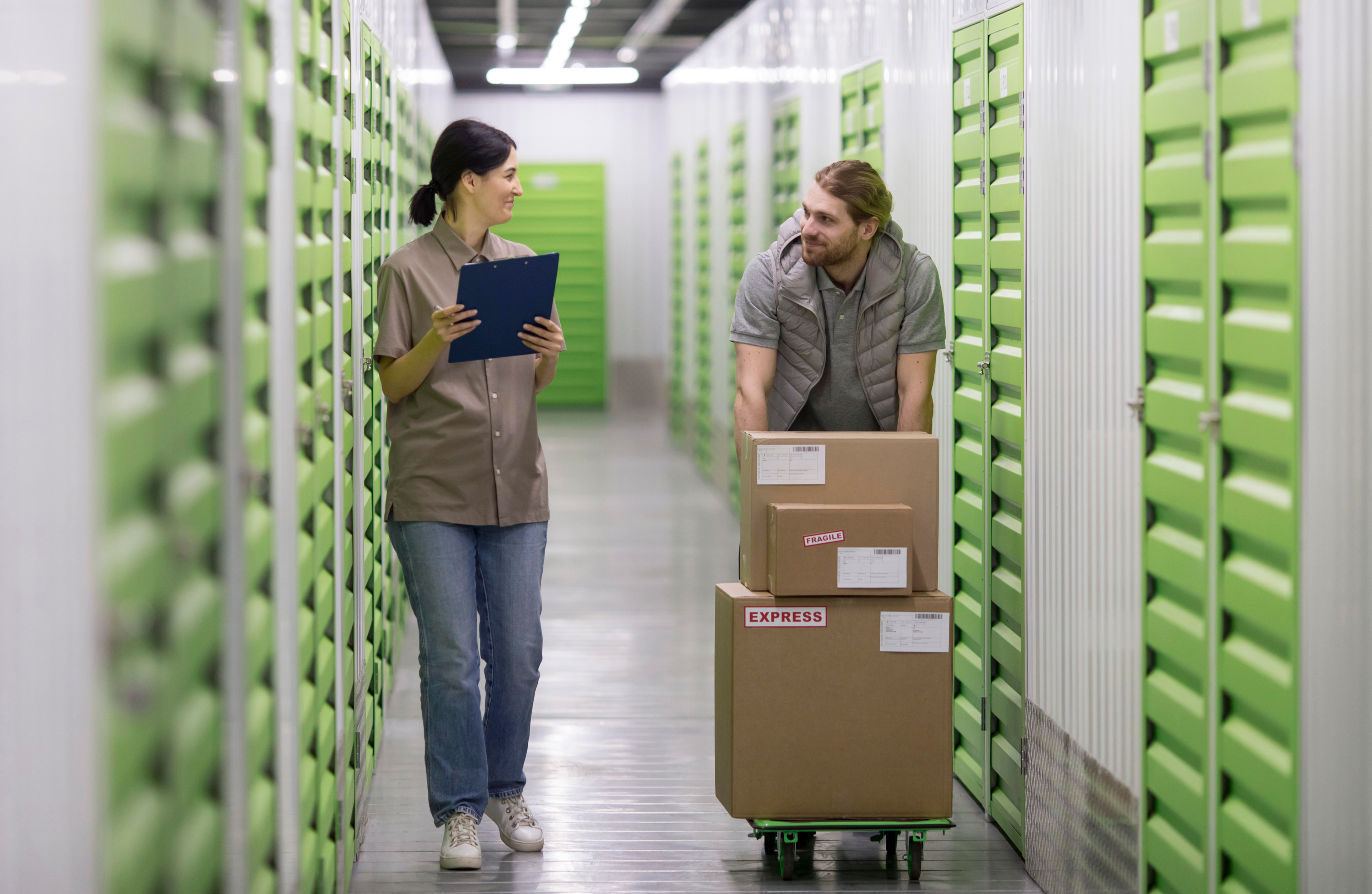 Man and woman in storage facility