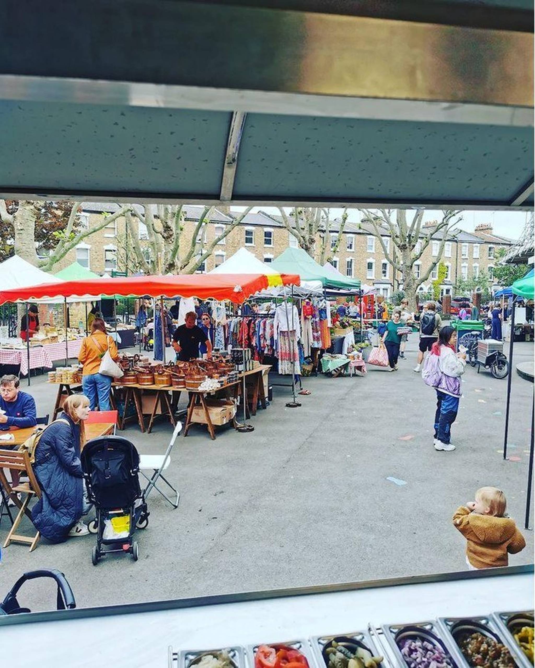 POV from inside one of the food stalls in Stroud Green Market