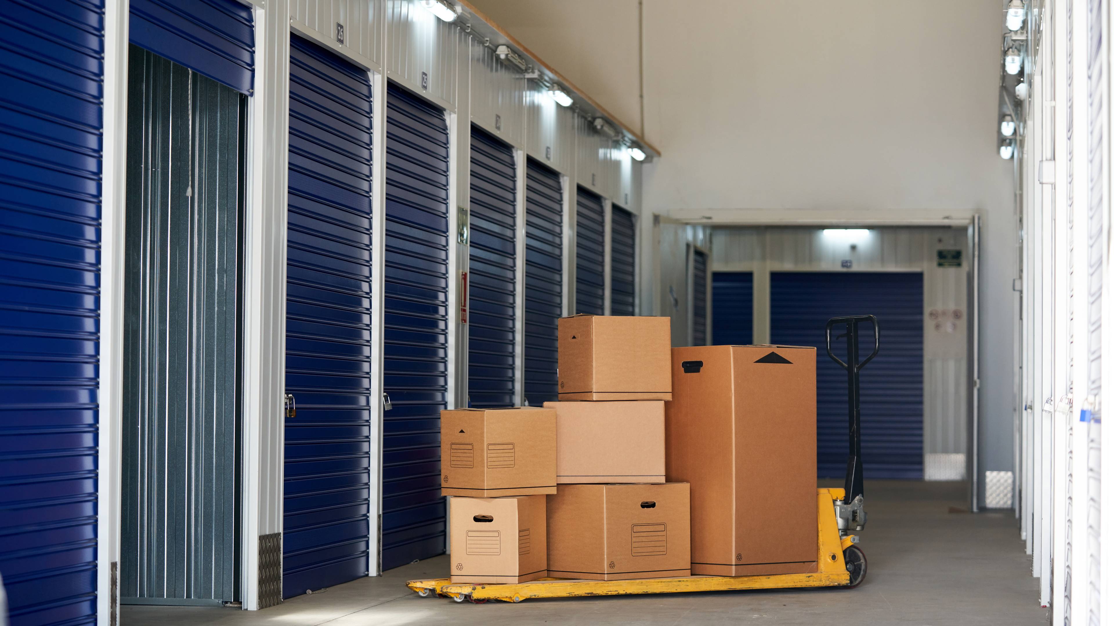 Pile of boxes outside a storage unit.