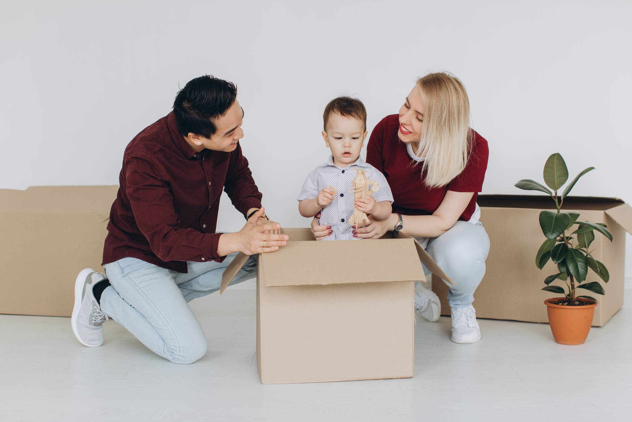 A family playing around with a toddler