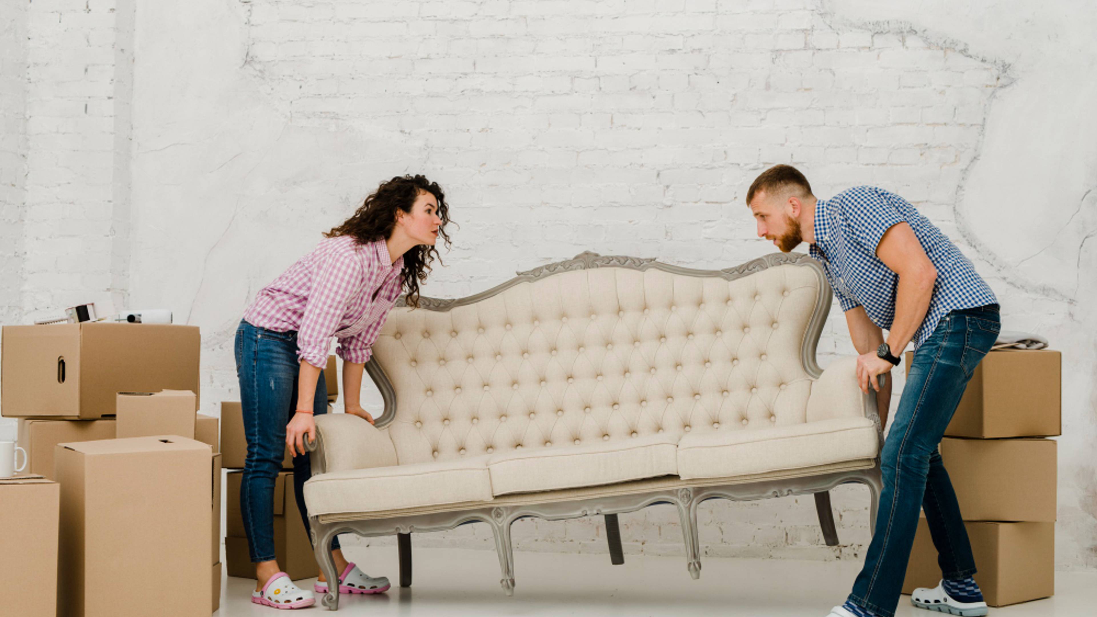 couple living upholstered sofa