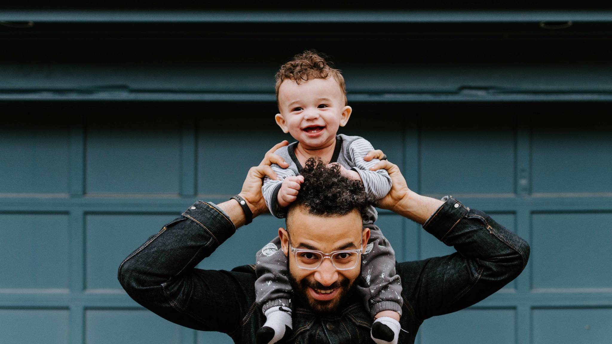 Man and child using self storage facilities