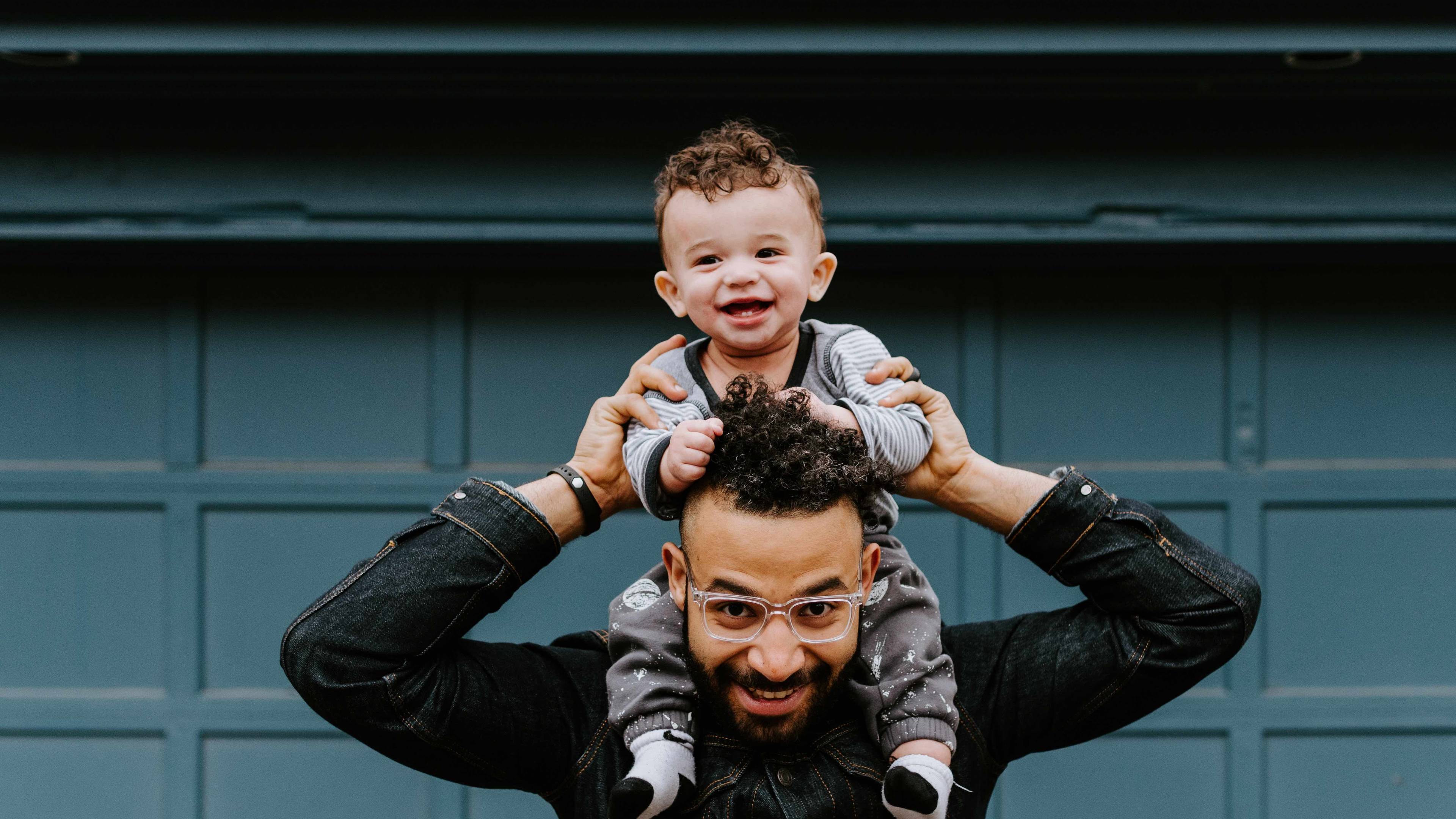 Man and child using self storage facilities