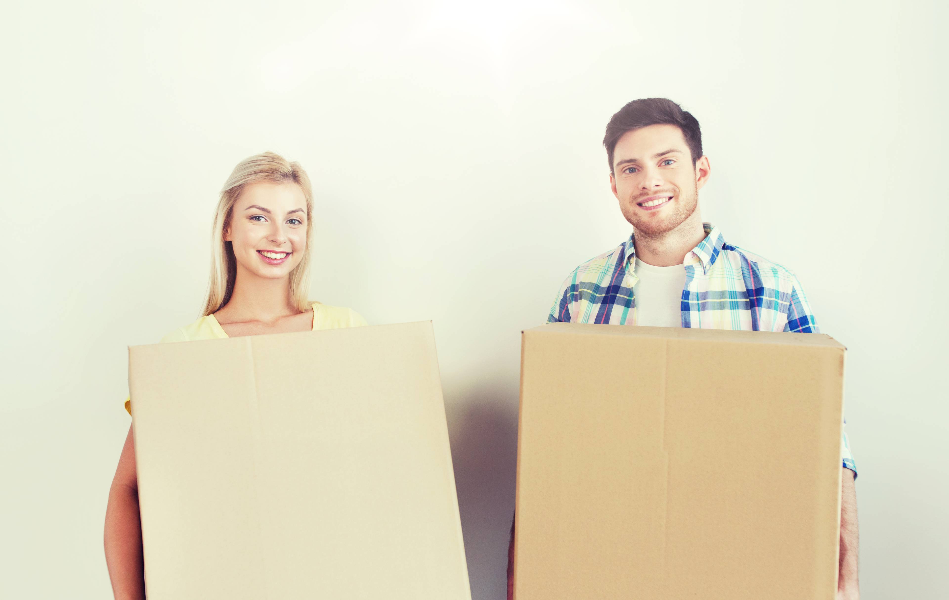 Woman carrying boxes