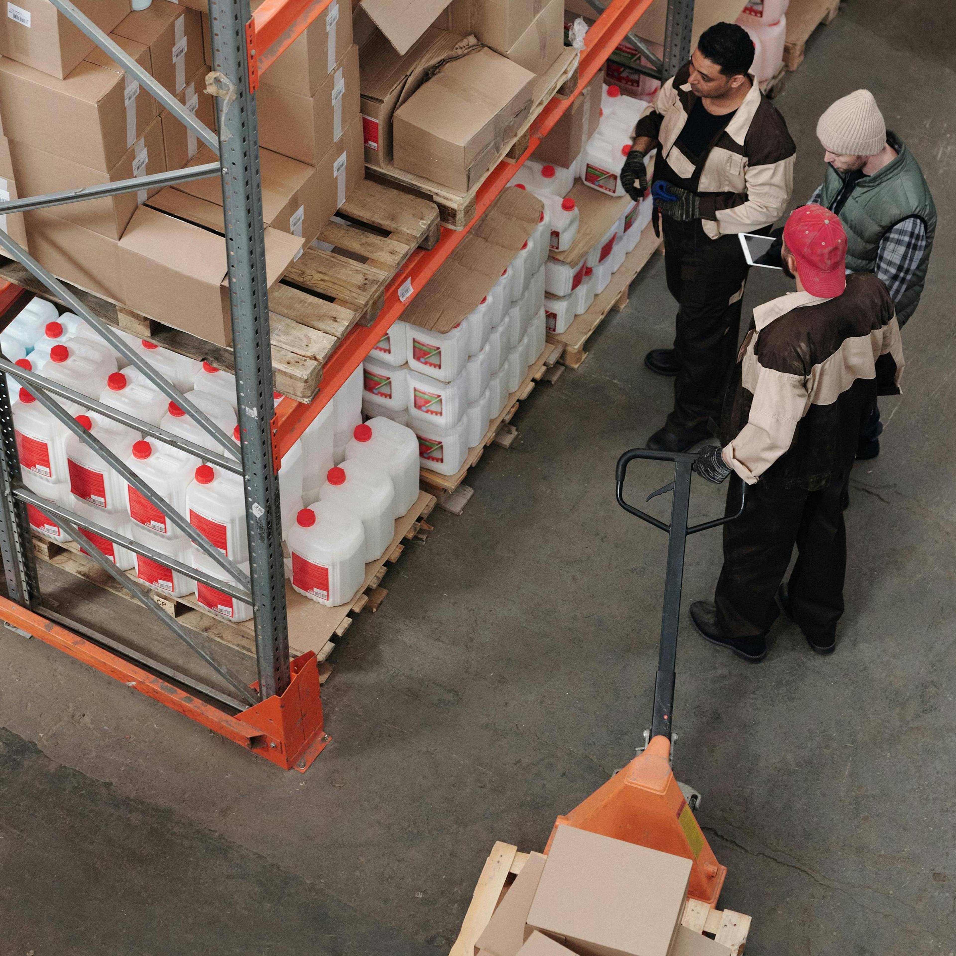 Top view of workmen in warehouse