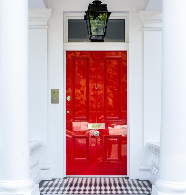 red front door to nice uk home