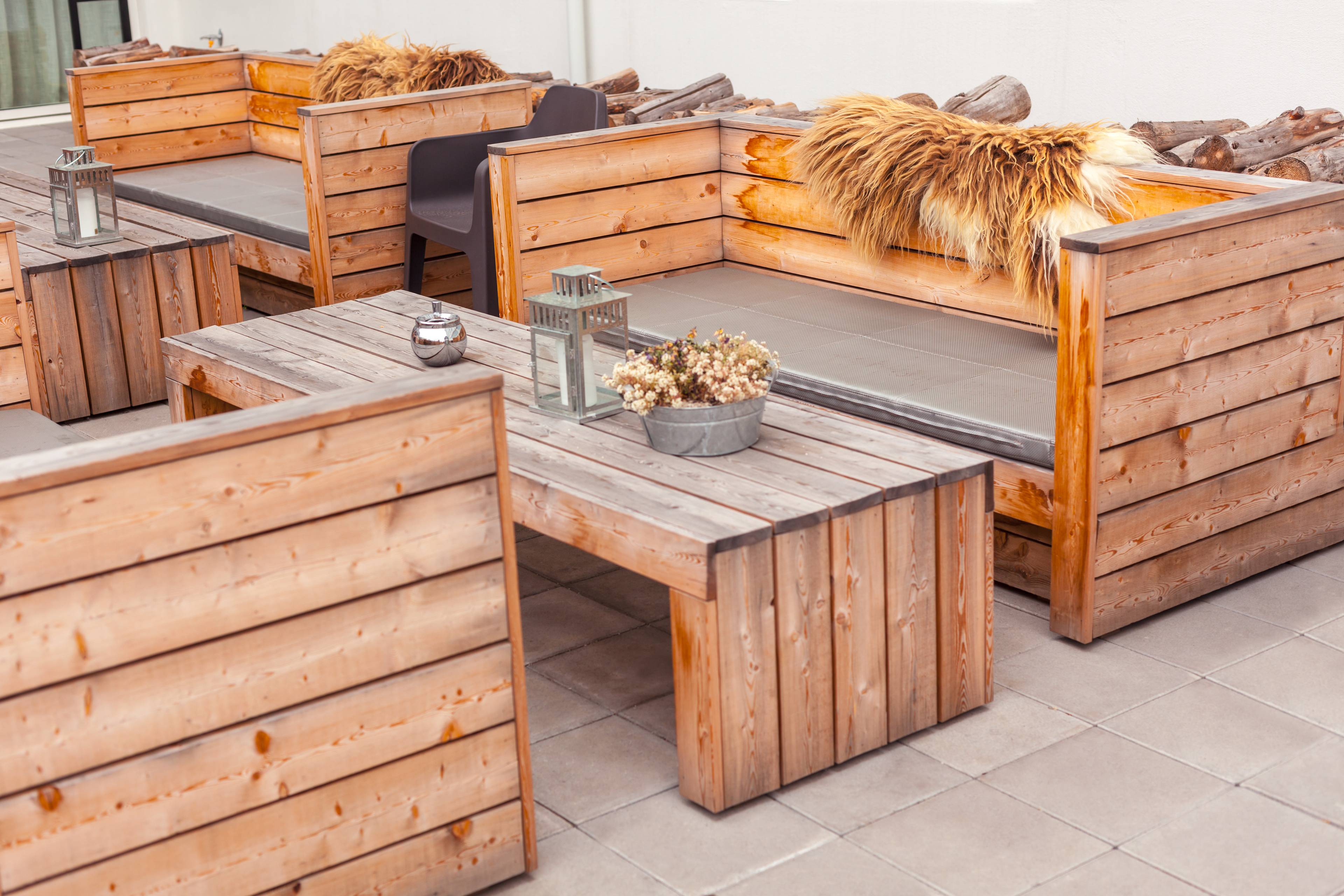 Outdoor restaurant terrace with wooden furniture