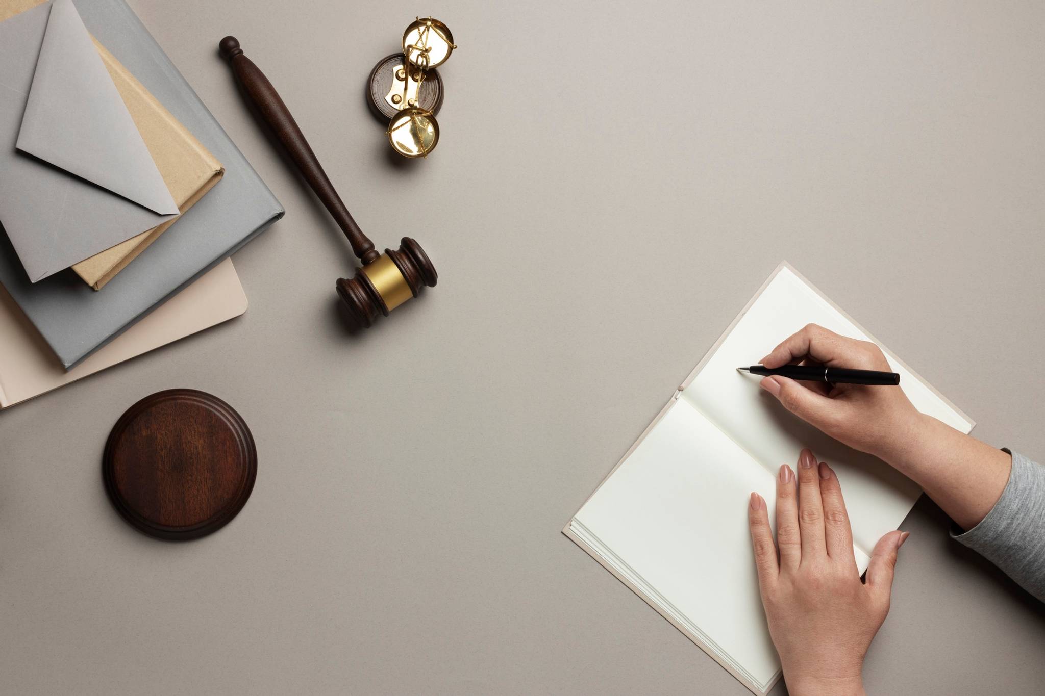 Top view of man writing on notebook