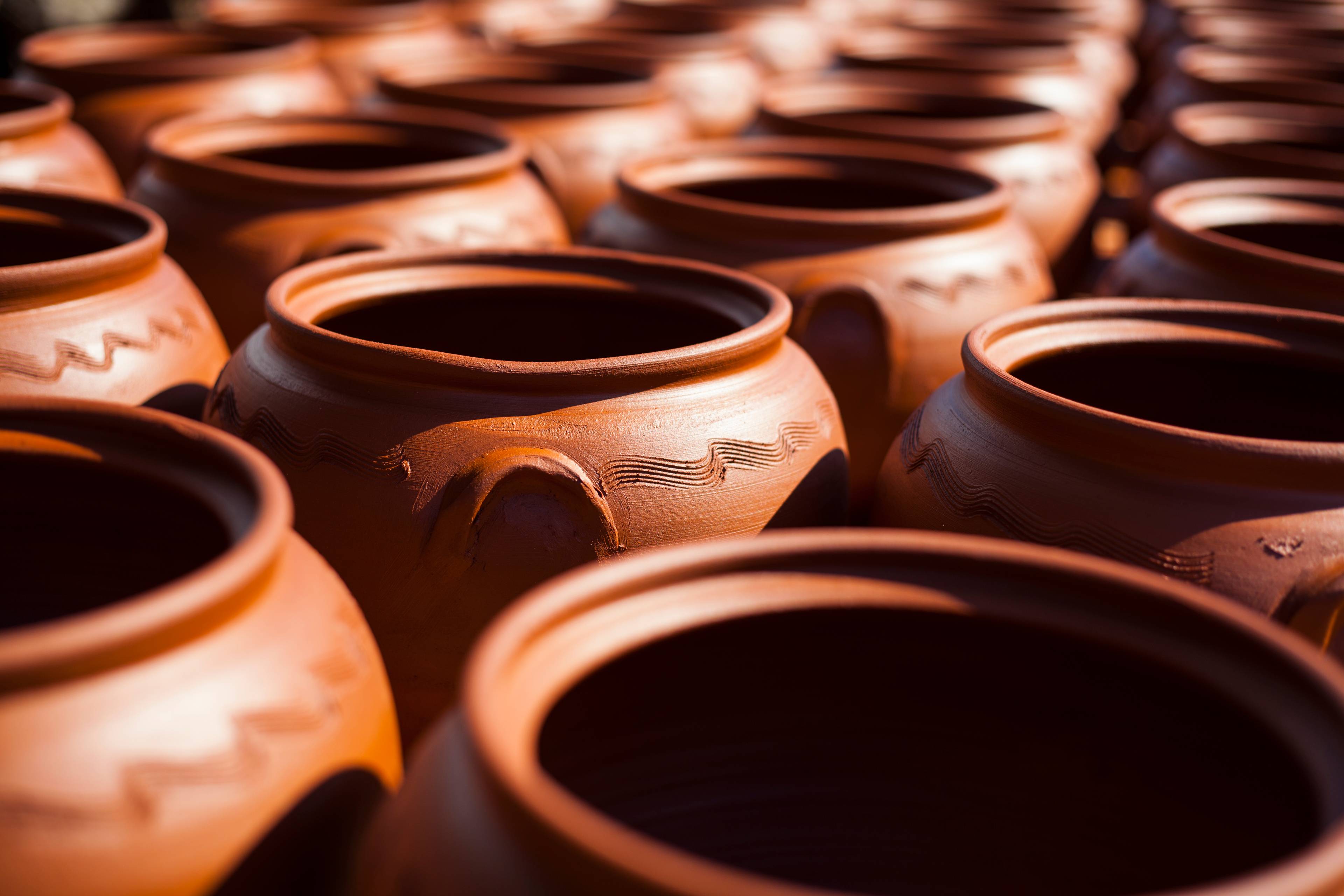 Side view of clay pots.