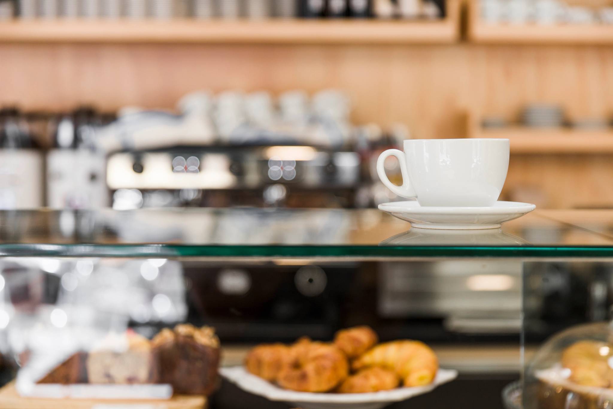 Coffee over glass cabinet in cafe shop