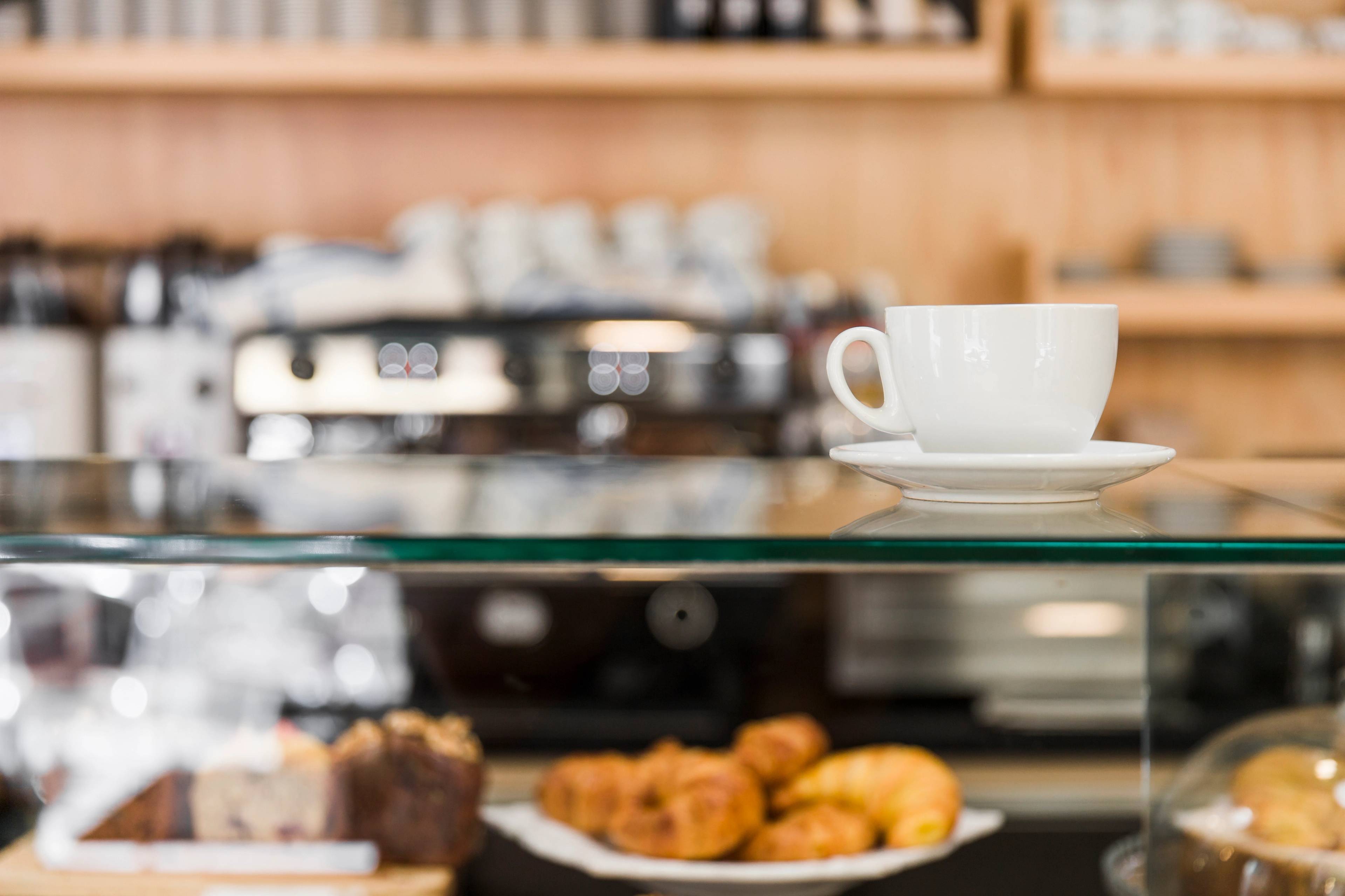 Coffee over glass cabinet in cafe shop