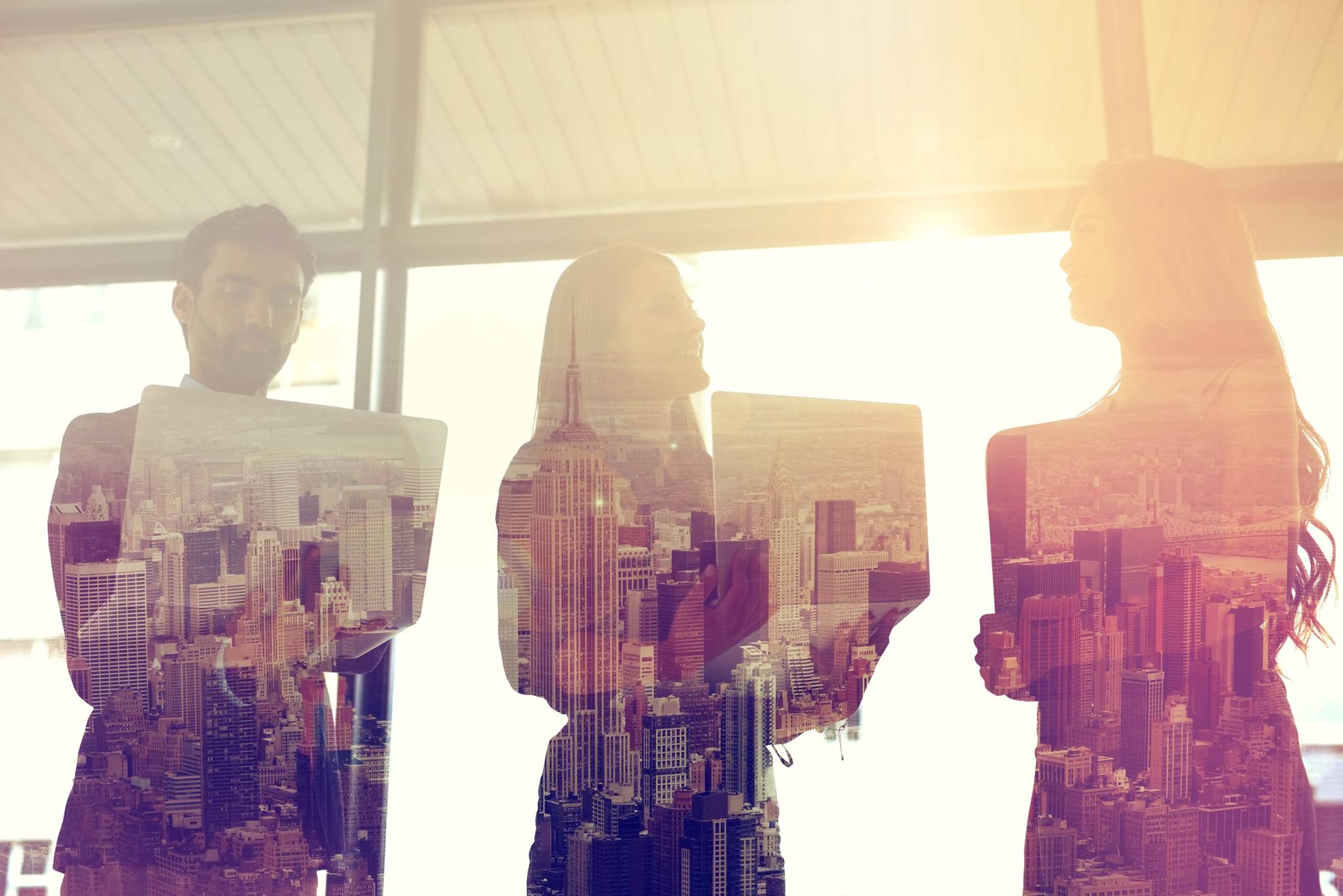 Plans to run the city Double exposure shot of three coworkers