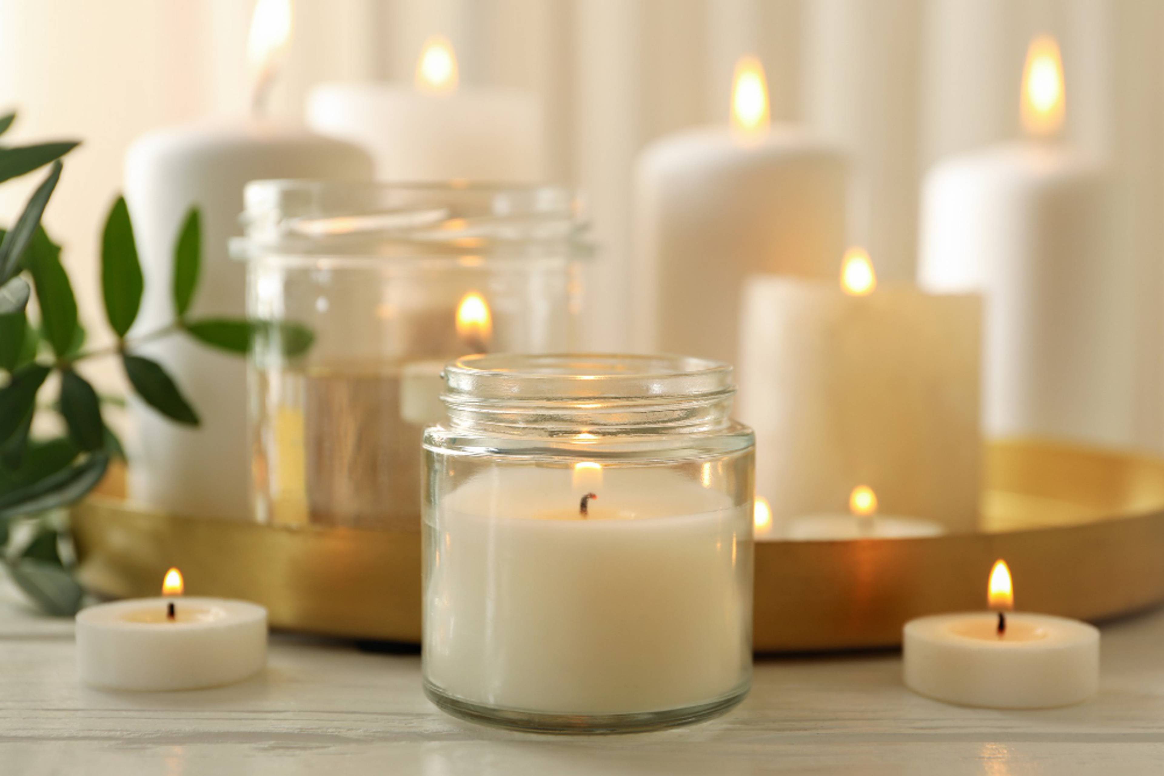 Candles of different sizes grouped together.