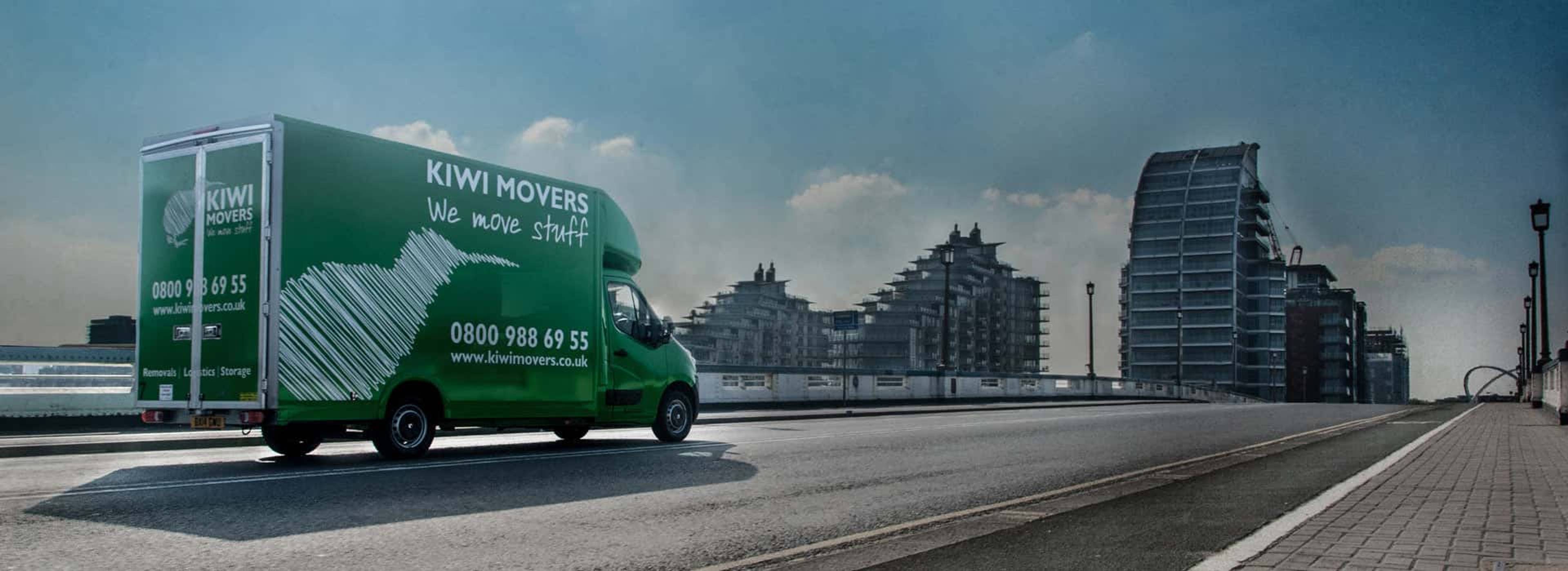 kiwi movers van on city bridge