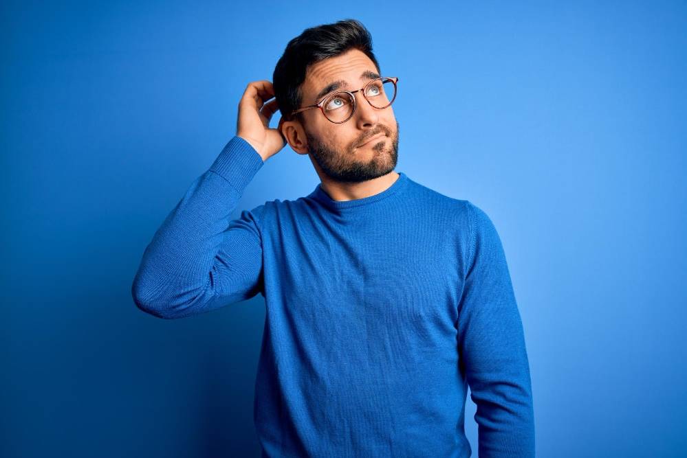 Confused person in blue