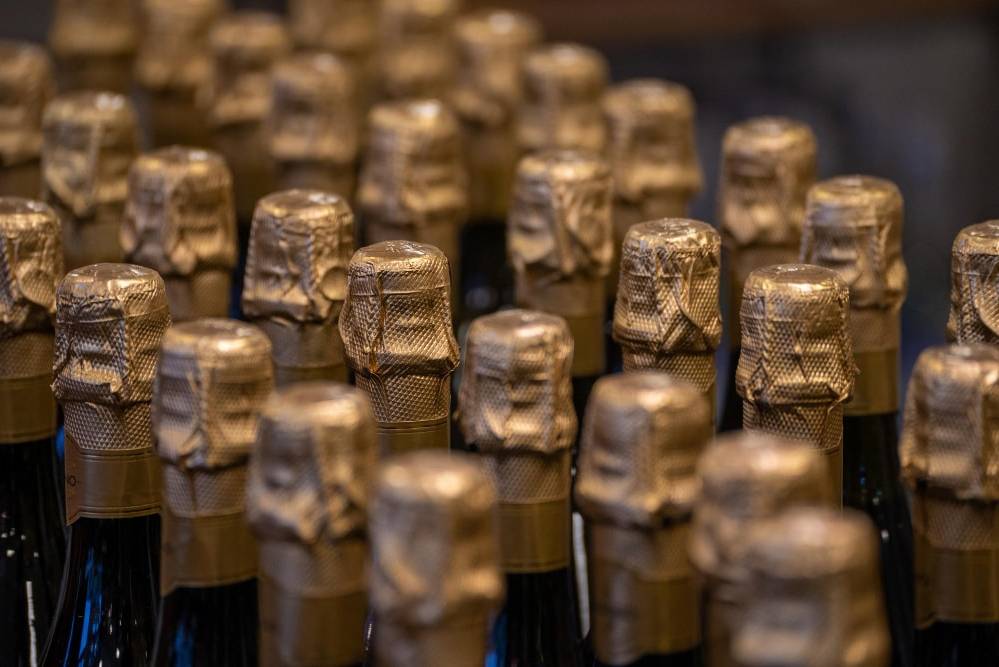 tops of champaigne bottles