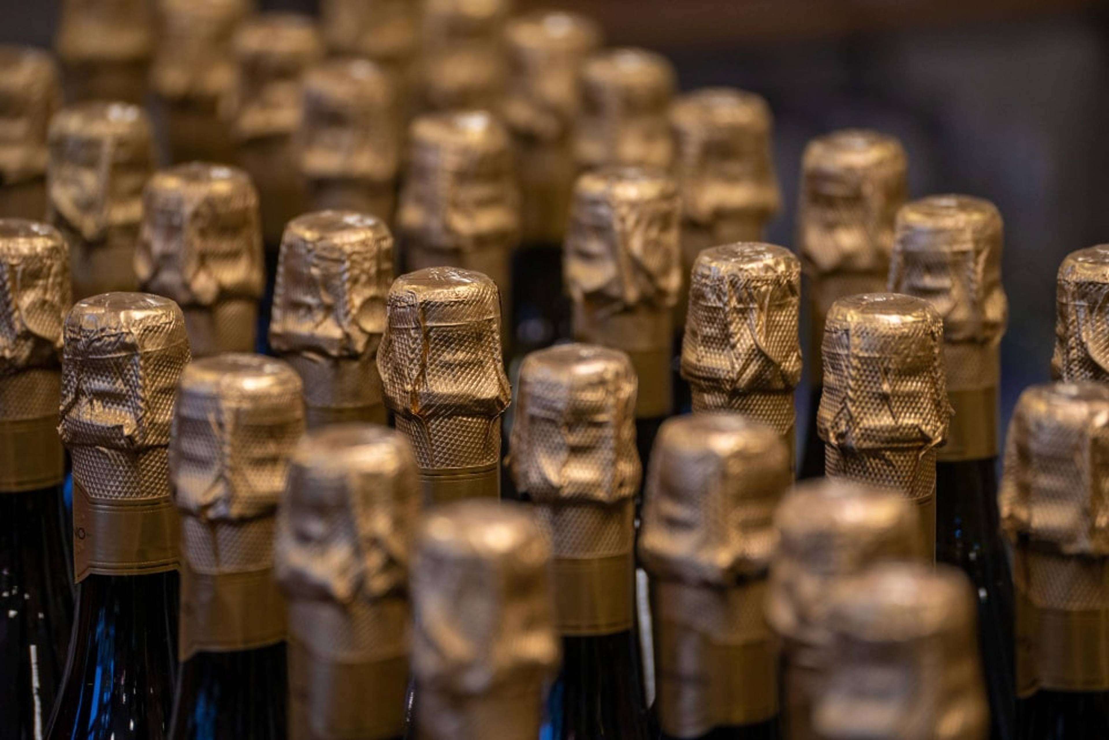 tops of champaigne bottles