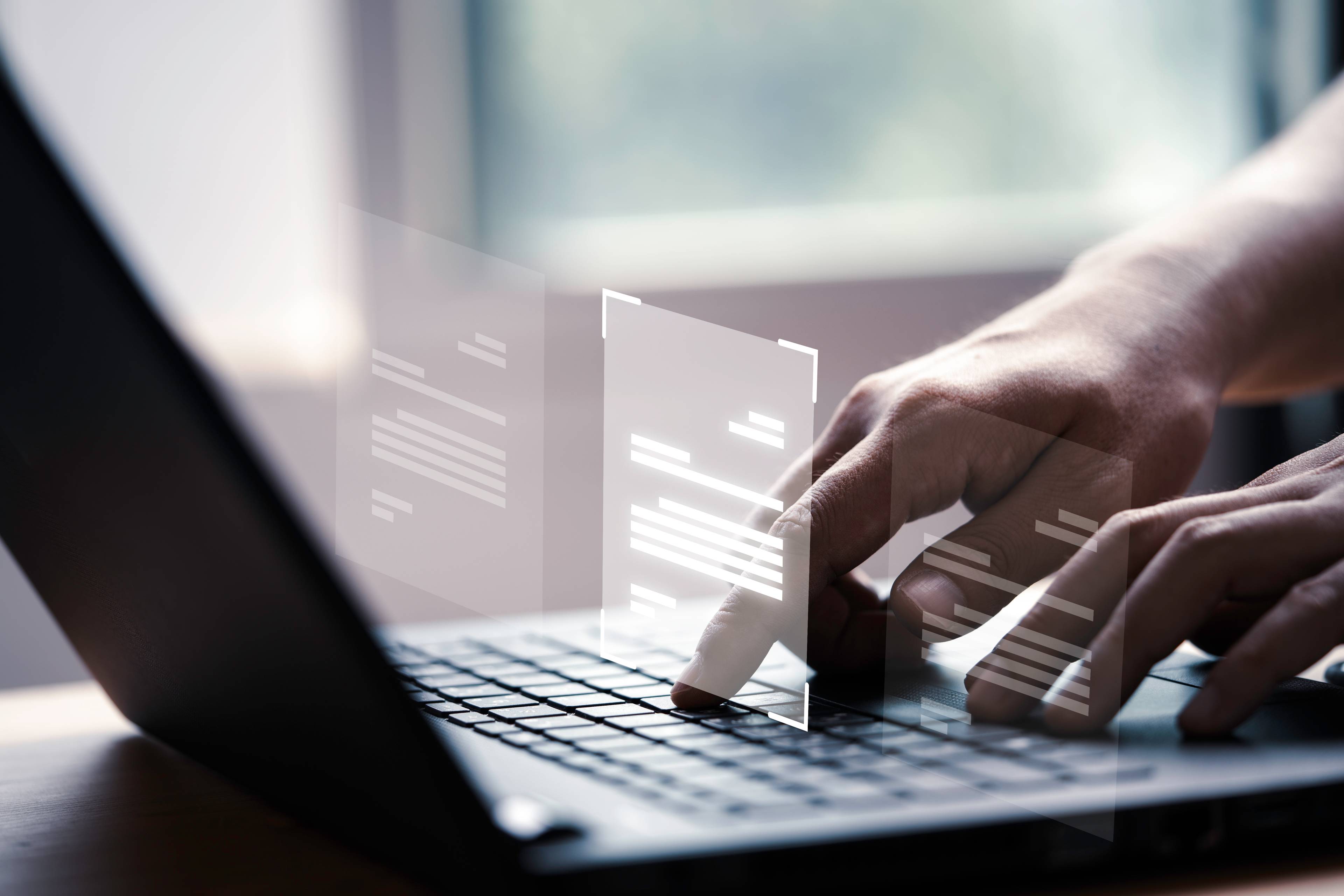 hand using laptop graphics of screens
