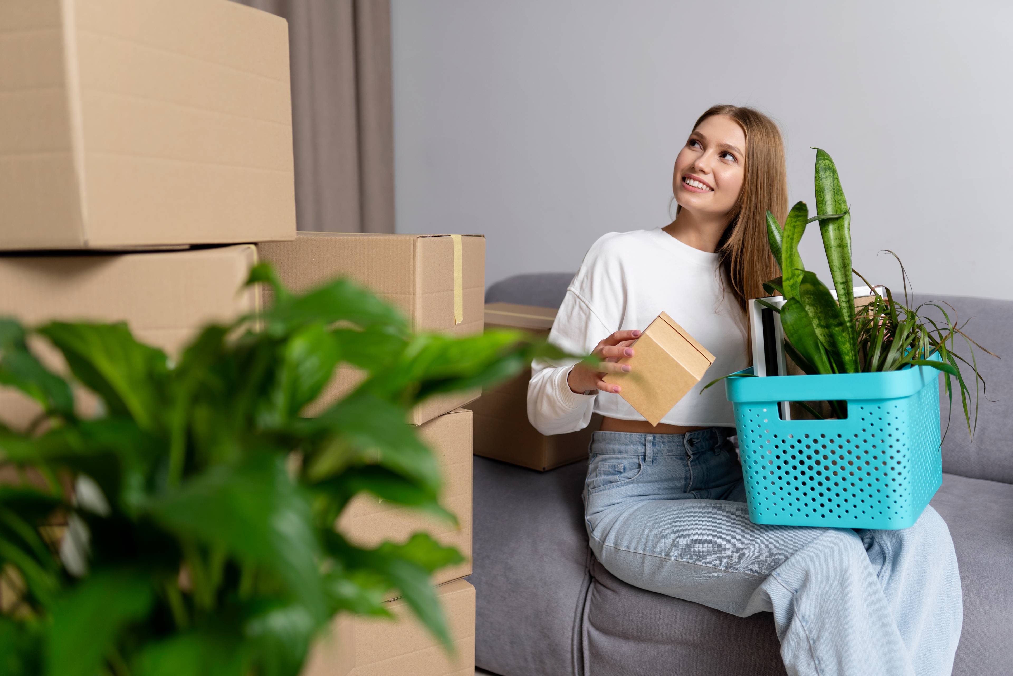 smiling woman handling boxes