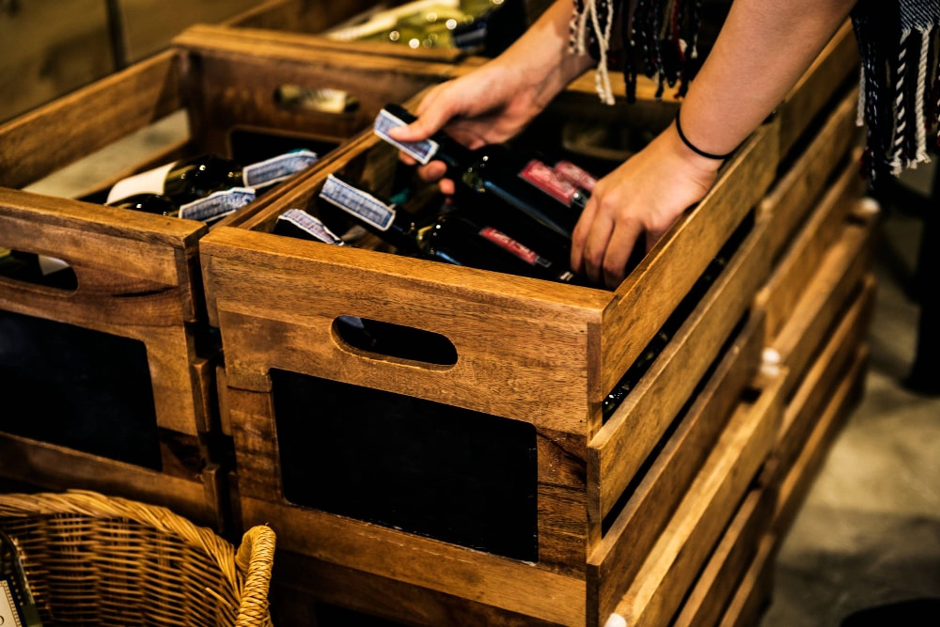 A box filled with various alcohol bottles