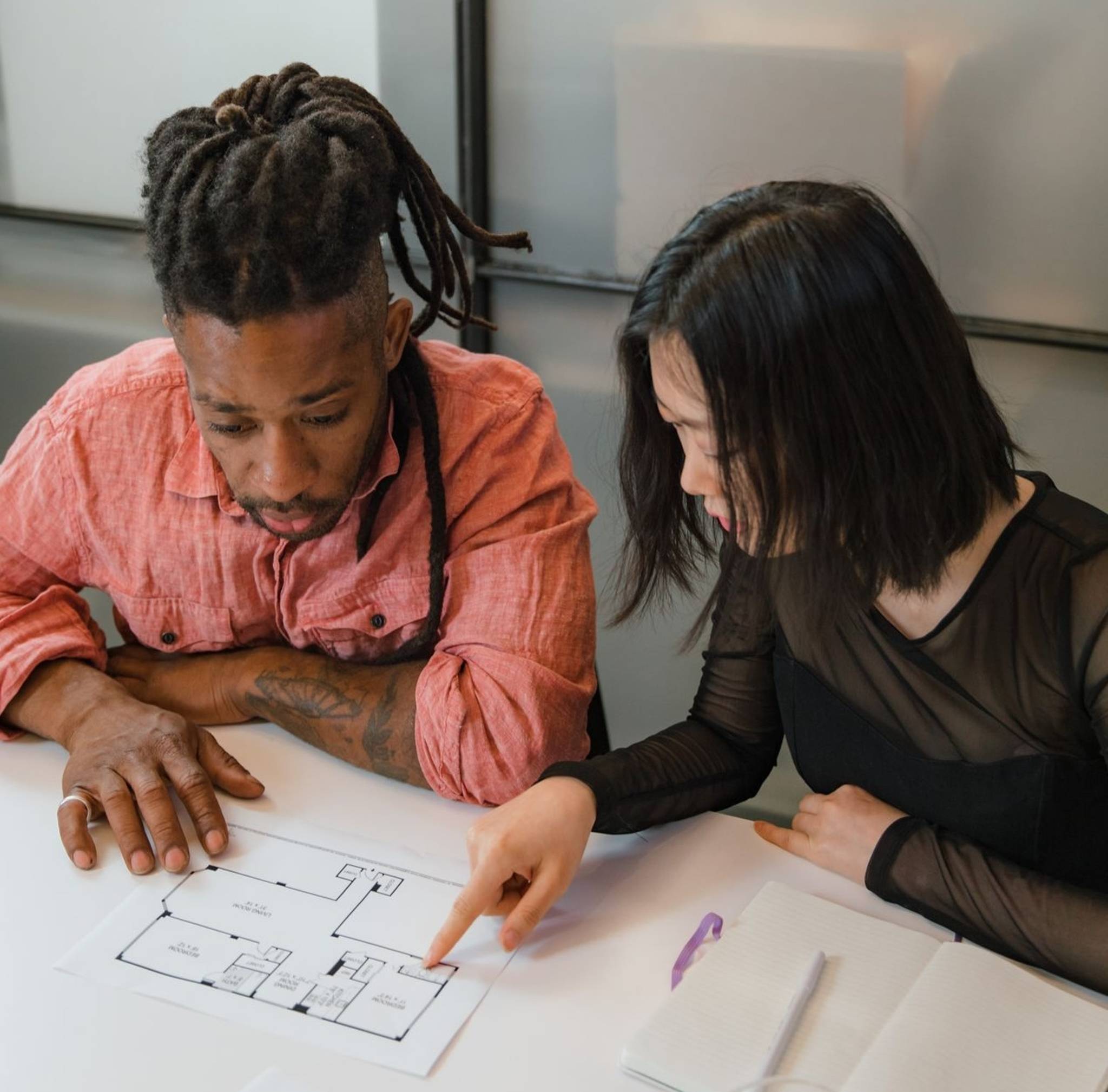 office workers planning layout of new office