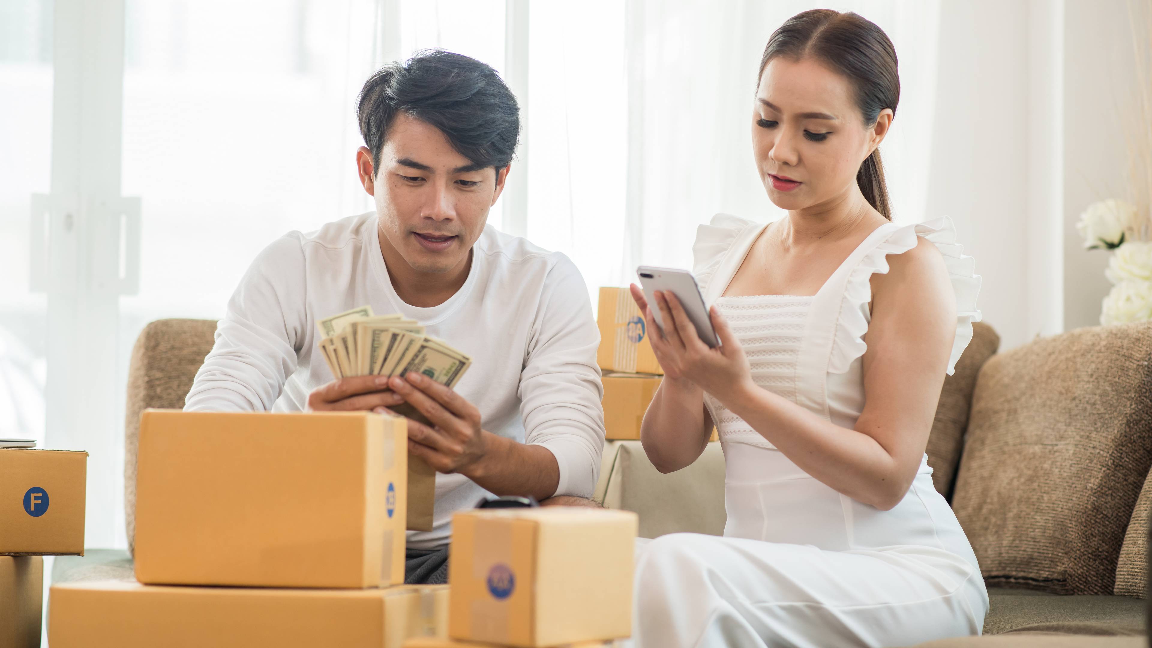 A couple with moving boxes