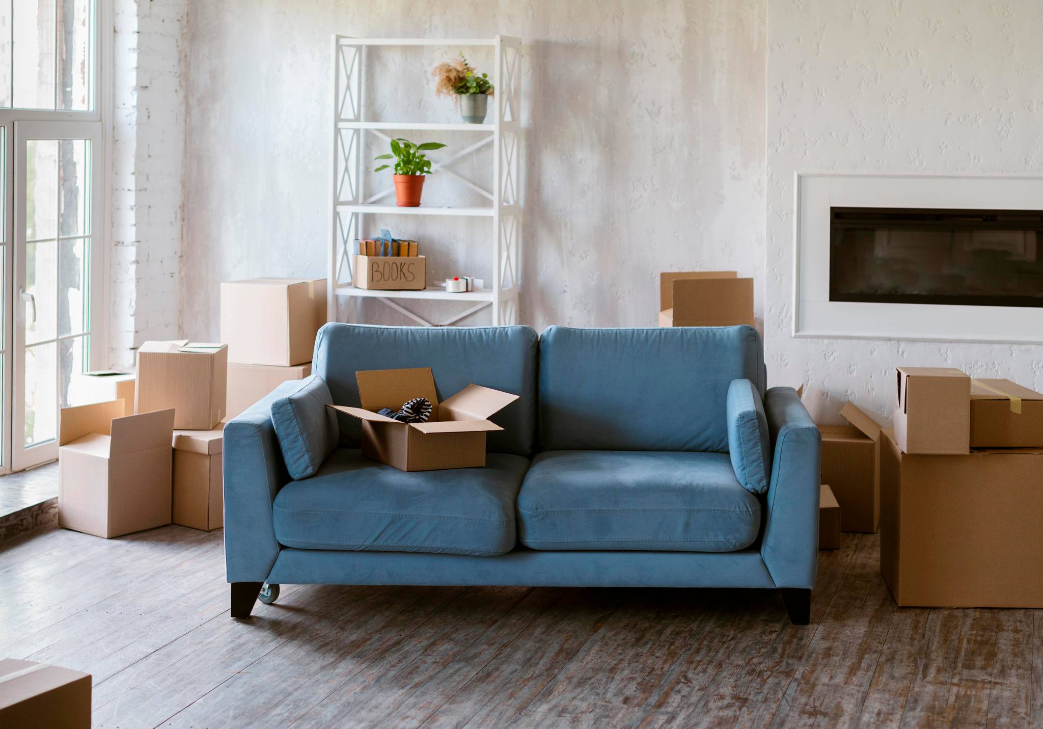 Furnitures in a living room being packed away