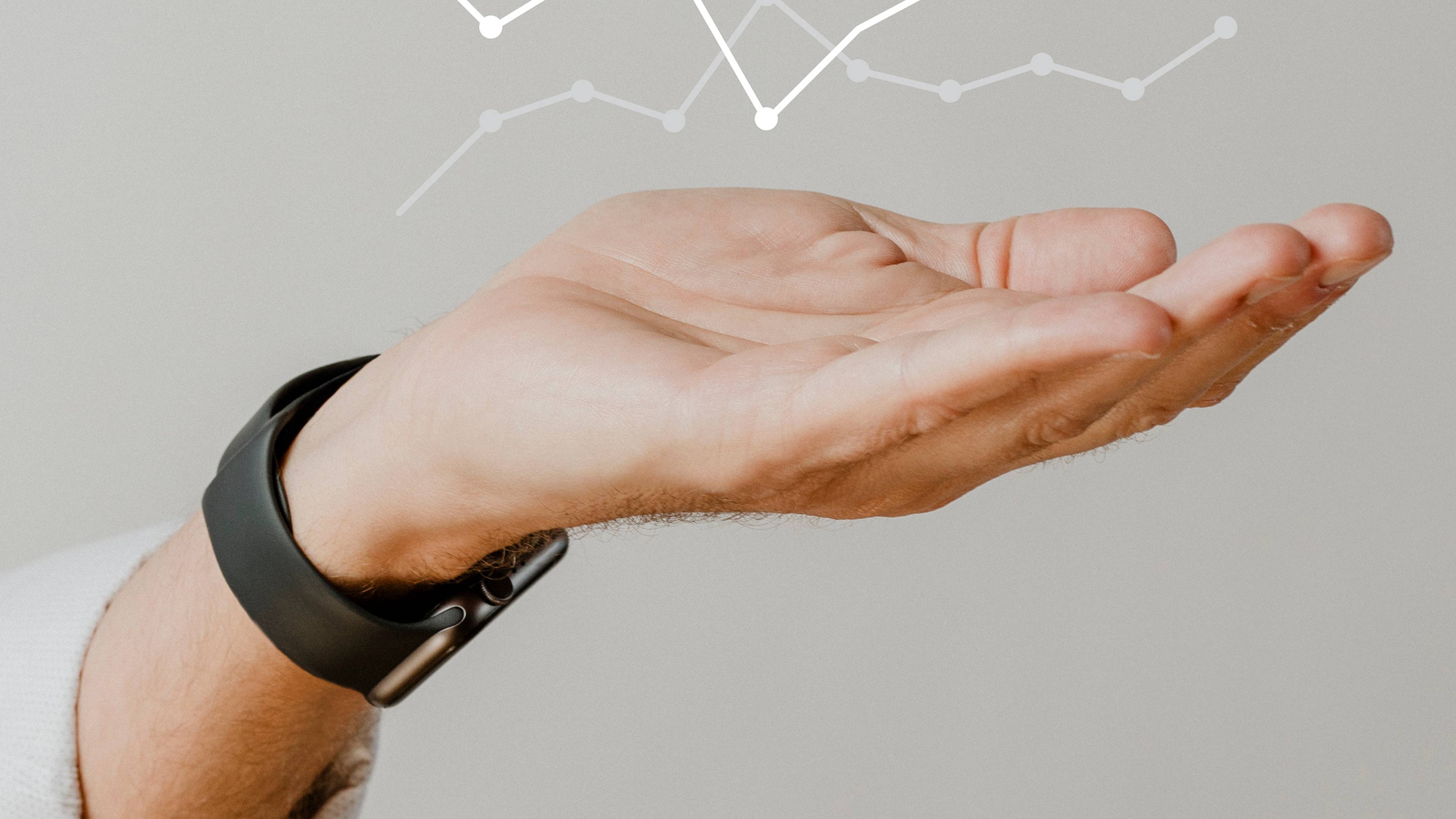 A graph on a man's hand.